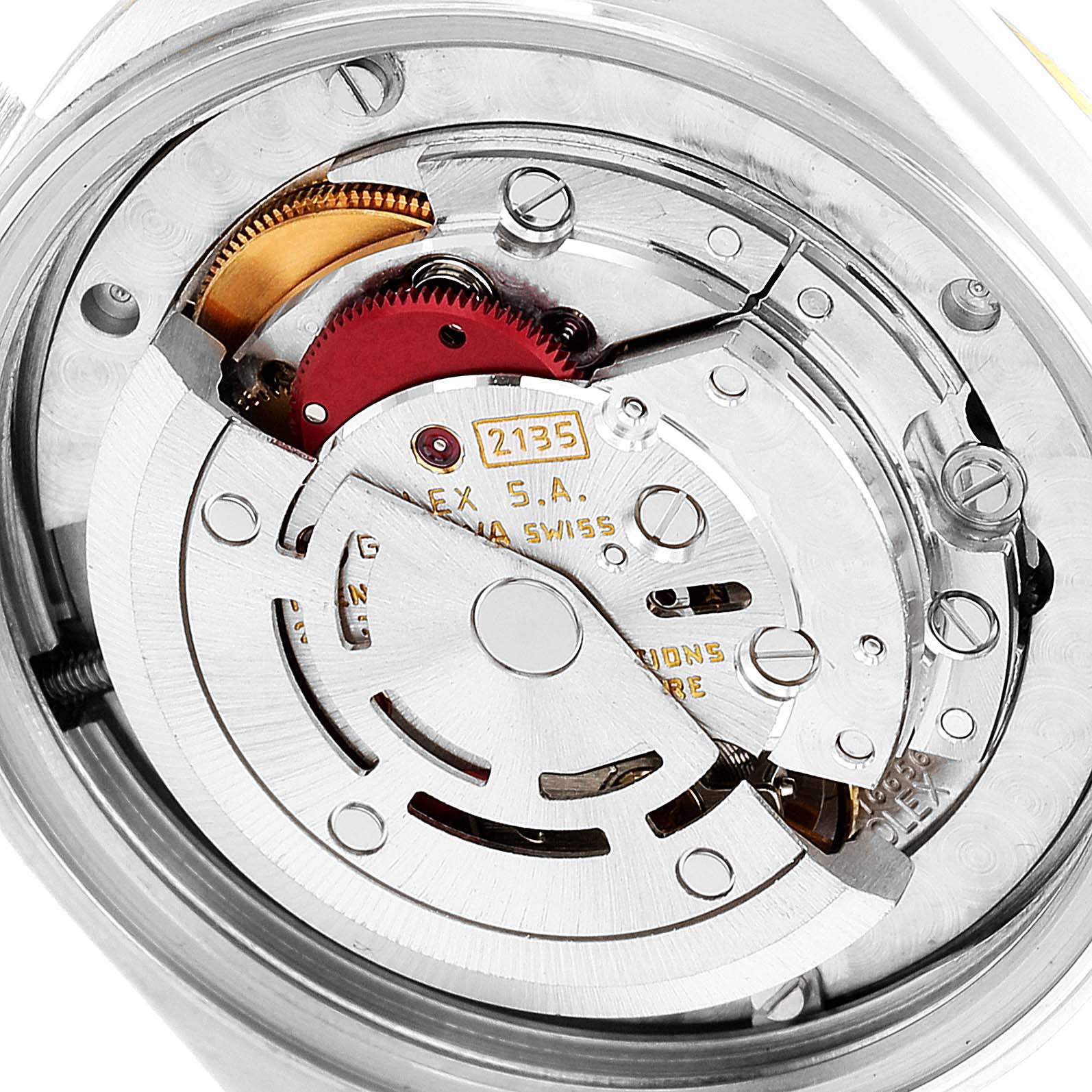 This image shows the intricate internal movement of a Rolex Mid-Size 68273 Women's Steel and Gold (two tone) Beige Dial 68273 Women's Steel and Gold (two tone) Beige Dial watch, viewed from the back.