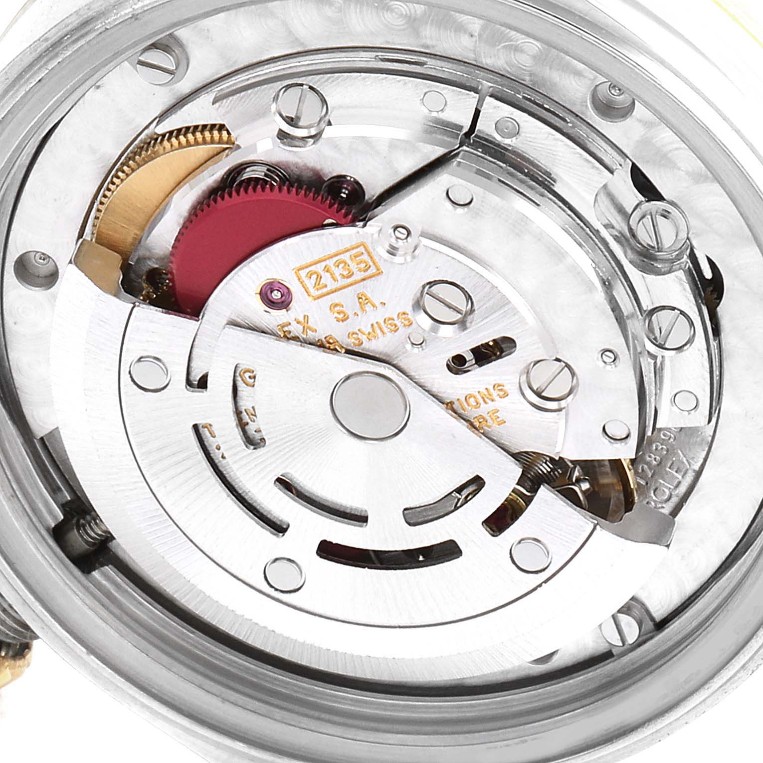 The image shows the internal mechanism of a Mid-Size Rolex watch viewed from the back.