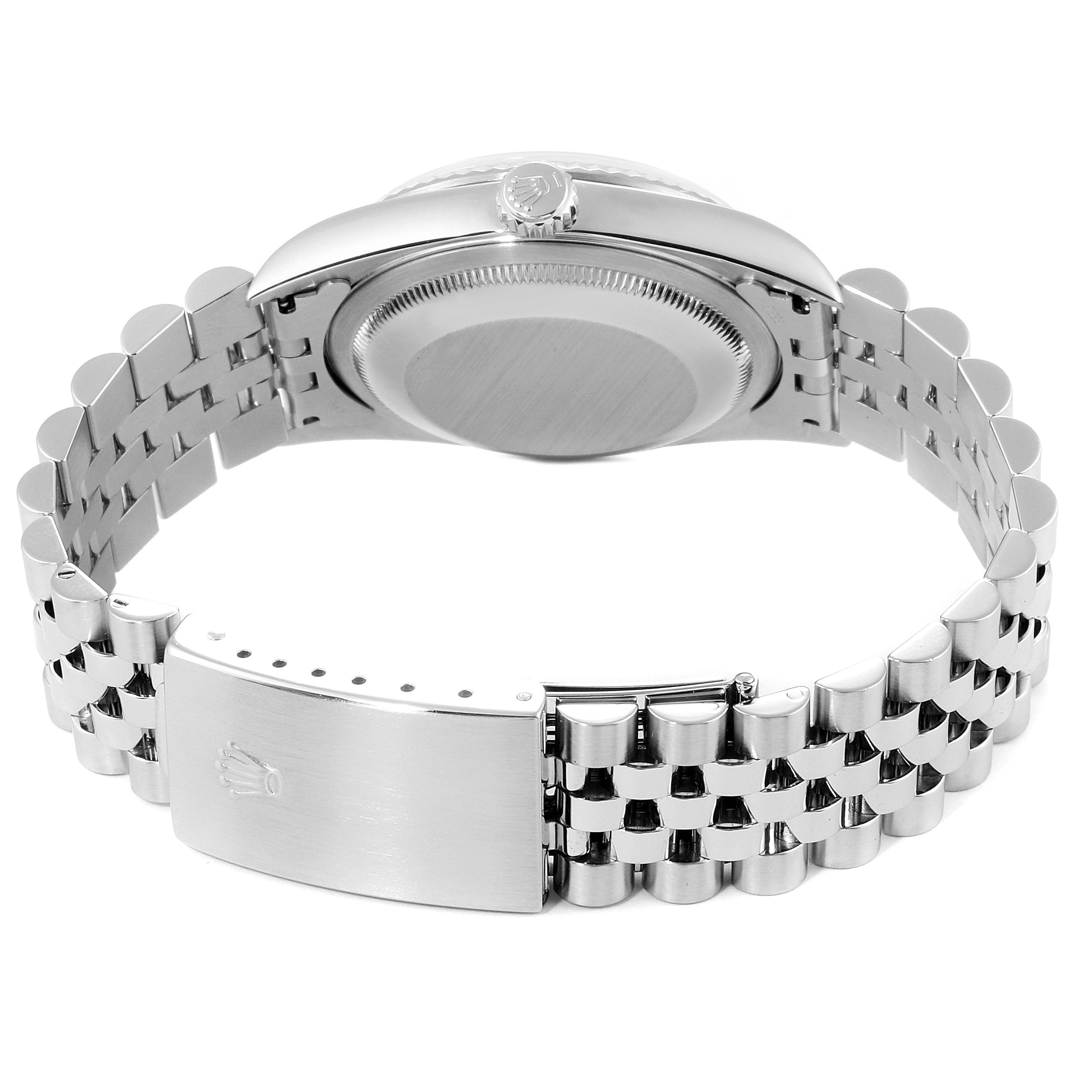 This image shows the back case, crown, and bracelet clasp of a Rolex Datejust 16234 Men's Stainless Steel Silver Dial 16234 Men's Stainless Steel Silver Dial watch from a bottom angle.