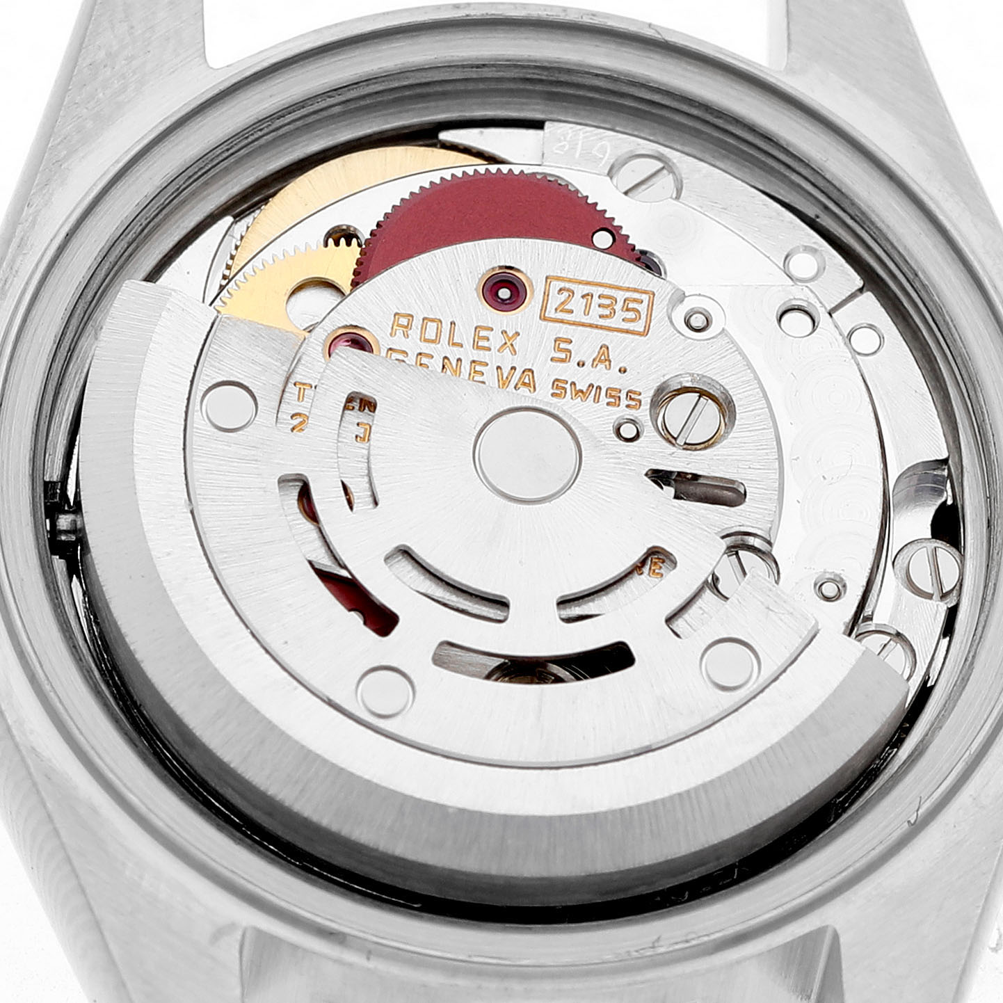The image shows the movement and inner mechanism of a Rolex Datejust 69173 Women's Yellow Gold Black Dial watch from a close-up angle, revealing its detailed components.
