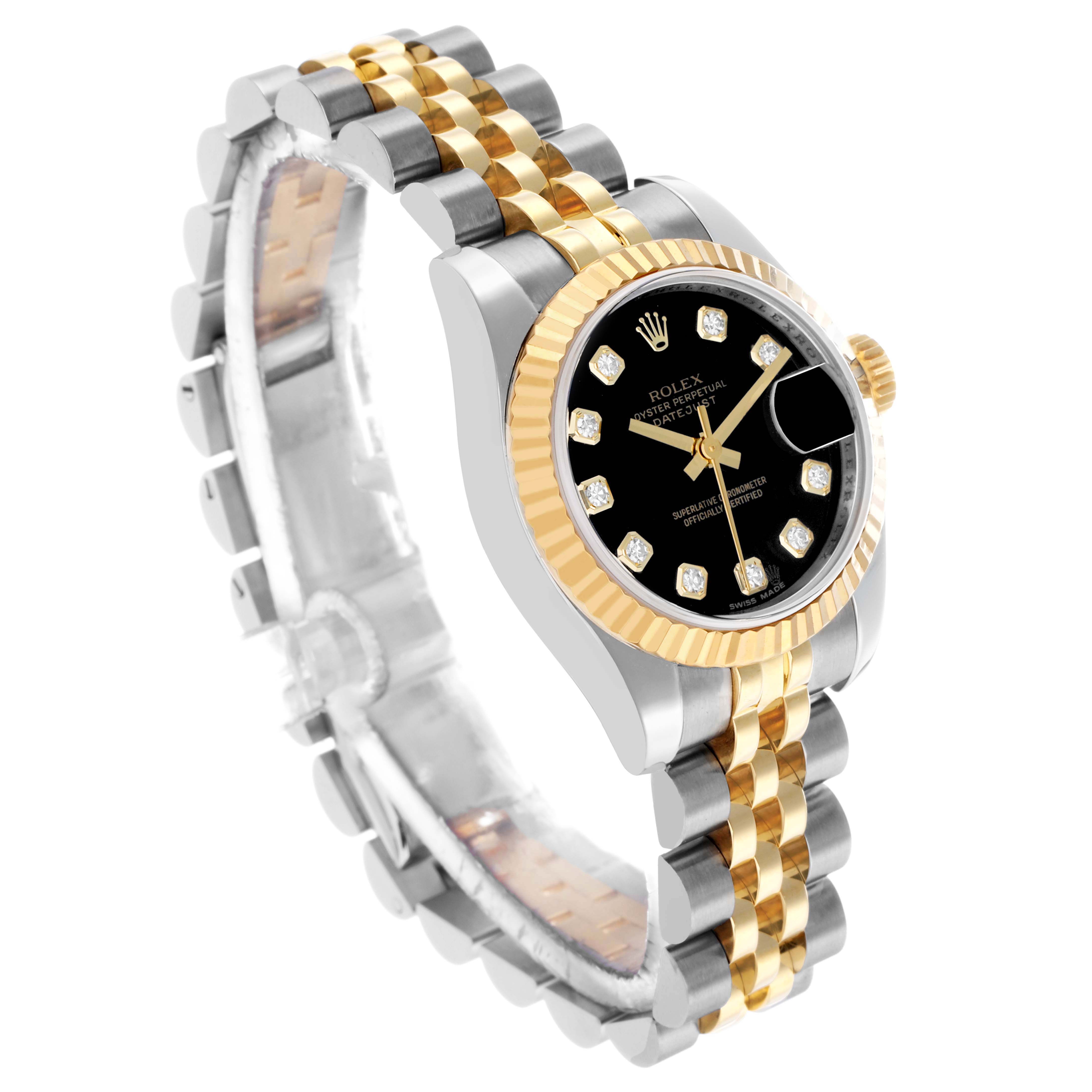 The Rolex Datejust 179173 Women's Steel and Gold (two tone) Black Dial watch is shown at a three-quarter angle, highlighting the gold fluted bezel, black dial, and two-tone Jubilee bracelet.