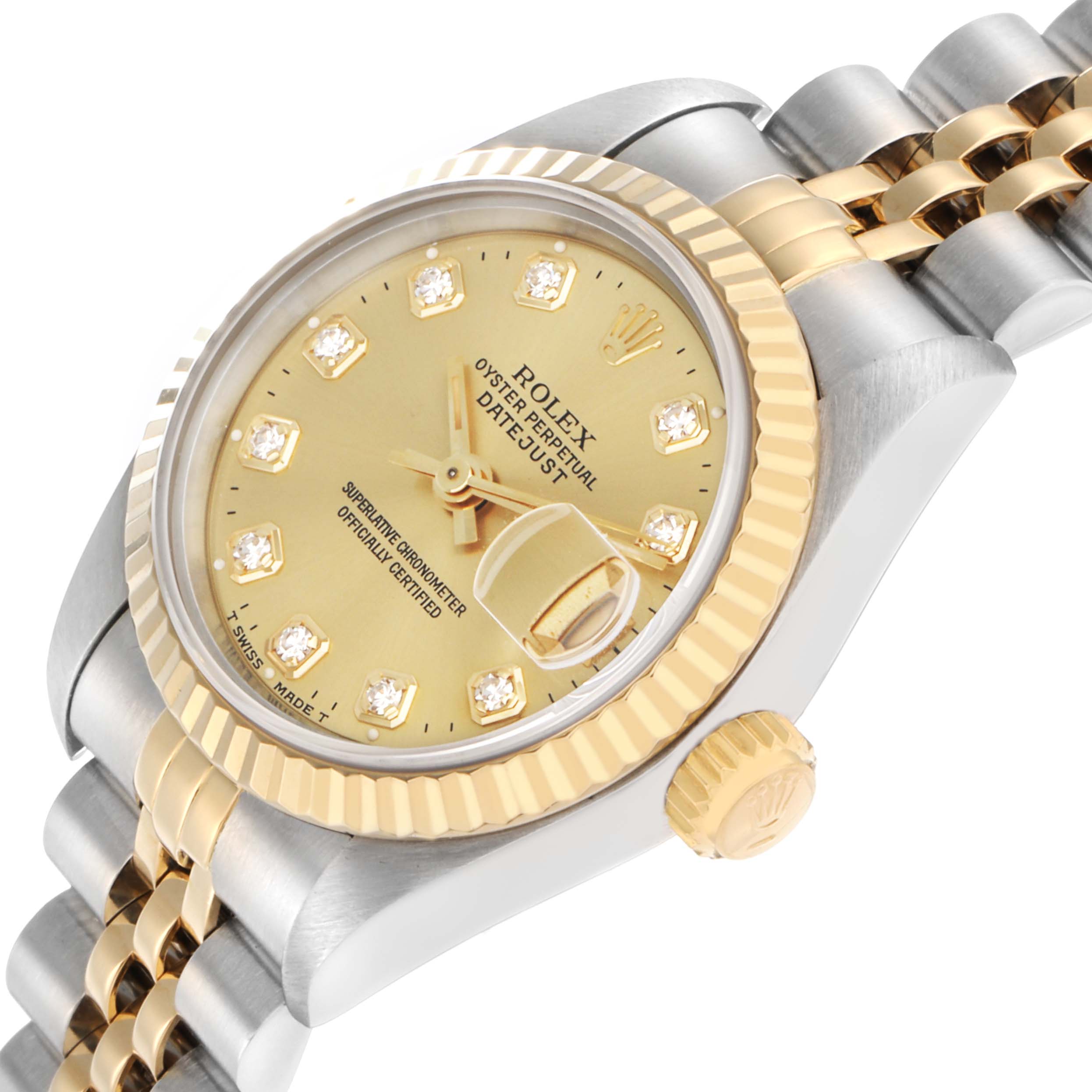 The Rolex Datejust 69173 Women
s Steel and Gold (two tone) Champagne Dial watch is shown at a slight side angle, highlighting the dial, bezel, crown, and part of the bracelet.