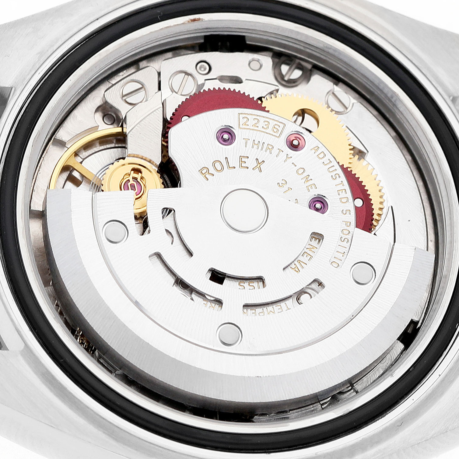 The image shows the movement with rotor and gears of a Rolex Datejust 279383 Women's Steel and Gold (two tone) Green Dial viewed from the back.