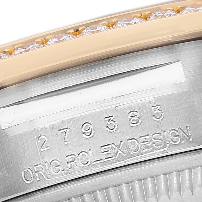 The image shows the side view of a Rolex Datejust 279383 Women's Steel and Gold (two tone) Green Dial model, highlighting the engraved case details and part of the diamond-set bezel.