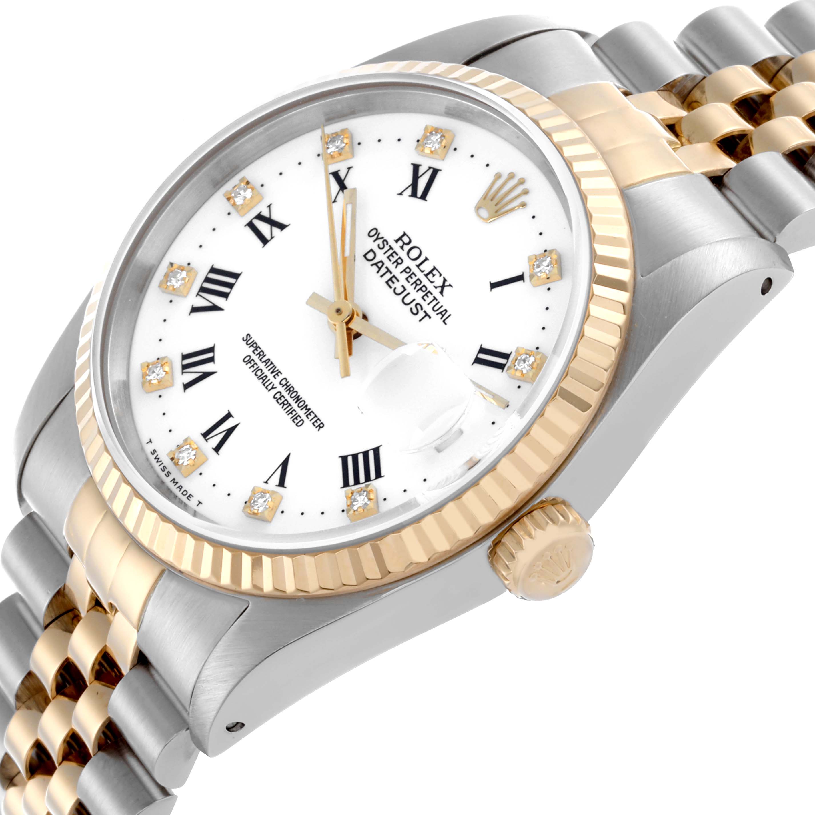 The Rolex Datejust 16233 Men
s Steel and Gold (two tone) White Dial 16233 Men
s Steel and Gold (two tone) White Dial watch is shown at an angled view, highlighting the case, bezel, crown, dial, and part of the bracelet.