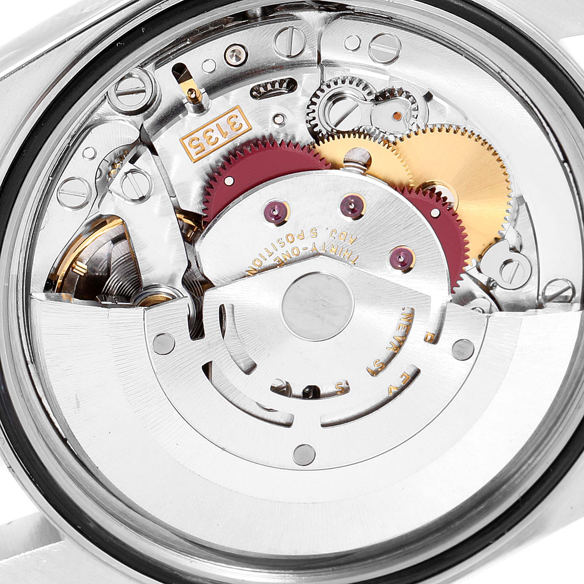 This image shows an angled close-up of the internal mechanical movement of a Rolex Datejust 16200 Men's Stainless Steel White Dial 16200 Men's Stainless Steel White Dial watch.