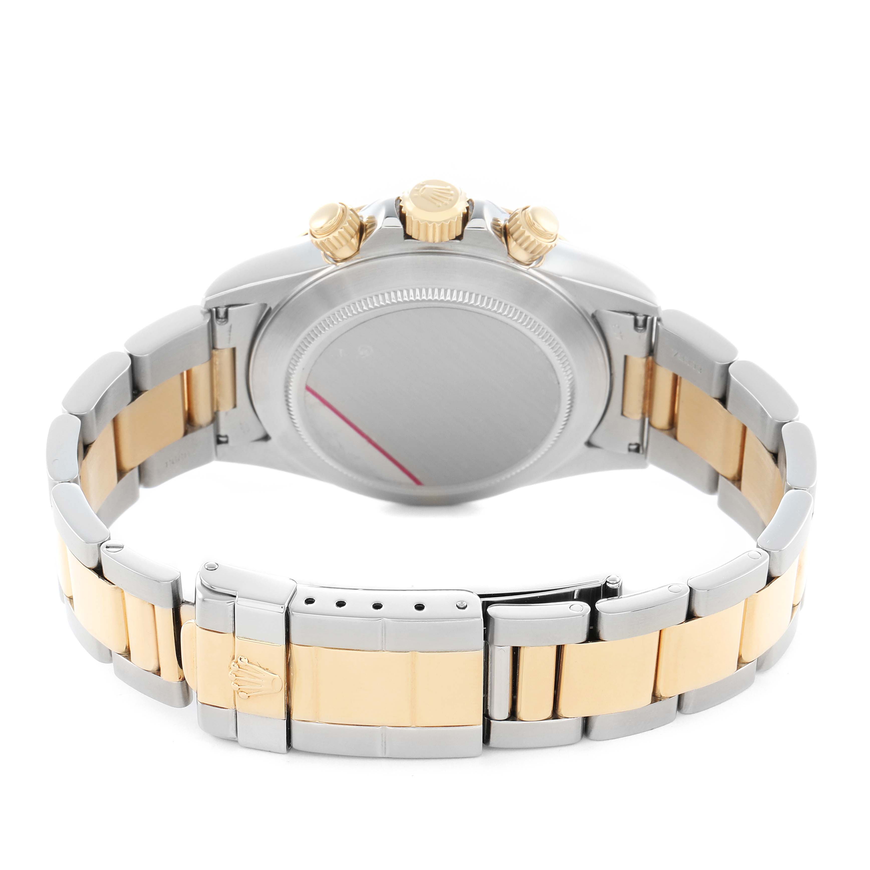 The image shows the back case and bracelet of a Rolex Daytona 16523 Men
s Steel and Gold (two tone) Champagne Dial, highlighting the clasp, links, and crown from a rear angle.