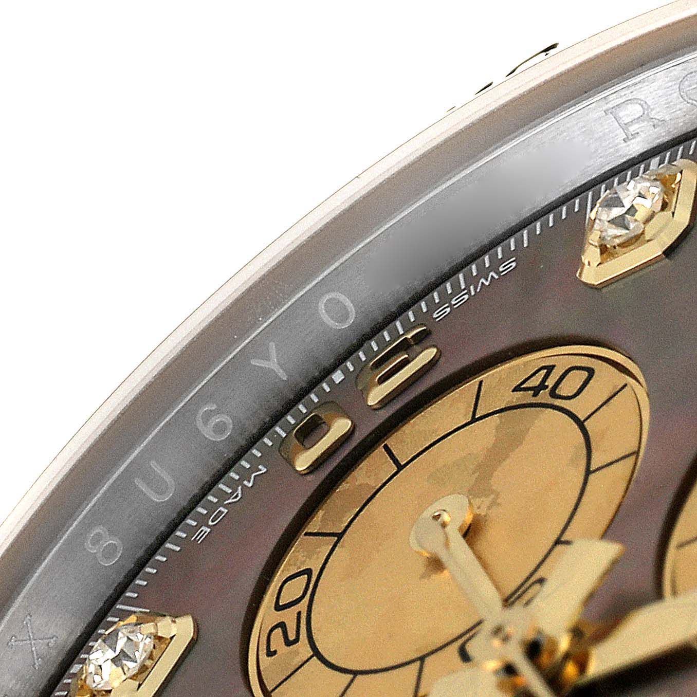 This image shows a close-up of the dial and bezel of a Rolex Daytona 116503 Men's Steel and Gold (two tone) Mother of Pearl Dial 116503 Men's Steel and Gold (two tone) Mother of Pearl Dial watch.