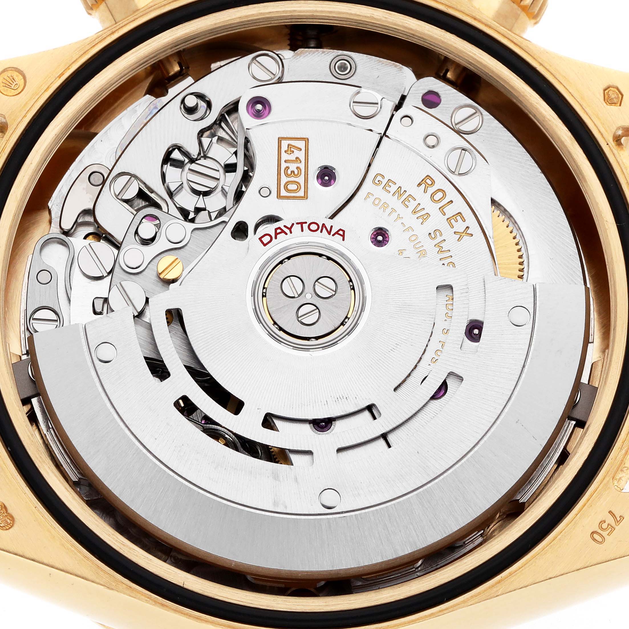 The image shows the movement mechanism of a Rolex Daytona 116508 Men
s Yellow Gold Mother of Pearl Dial watch from the back, highlighting the intricate parts and rotor.