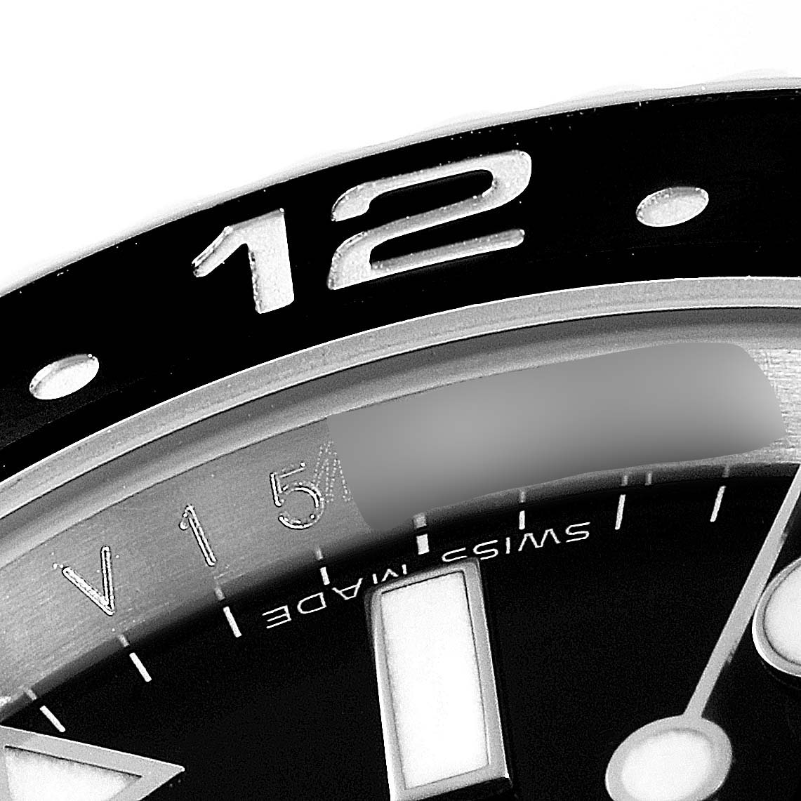 The image shows a close-up angle of a Rolex GMT-Master 116710 Men's Stainless Steel Black Dial 116710 Men's Stainless Steel Black Dial watch, focusing on the bezel, part of the dial, and hour markers.