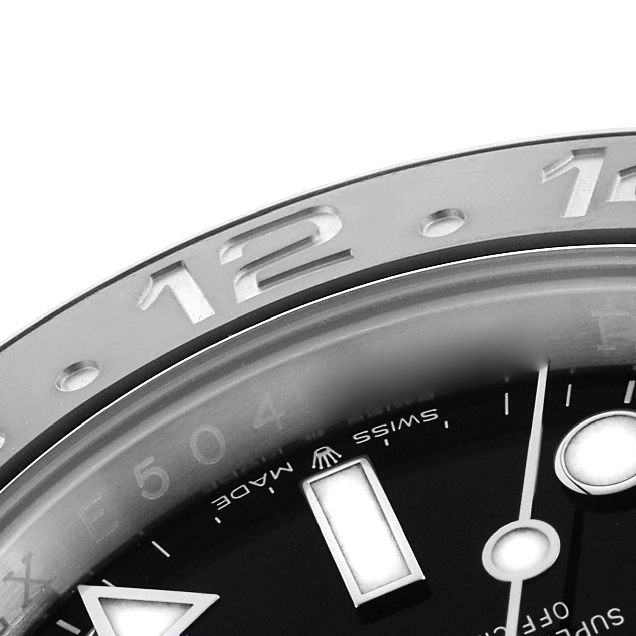 The image shows a close-up of the dial and bezel of a Rolex GMT-Master 126710 Men
s Stainless Steel Black Dial, highlighting the hour markers and part of the bezel.
