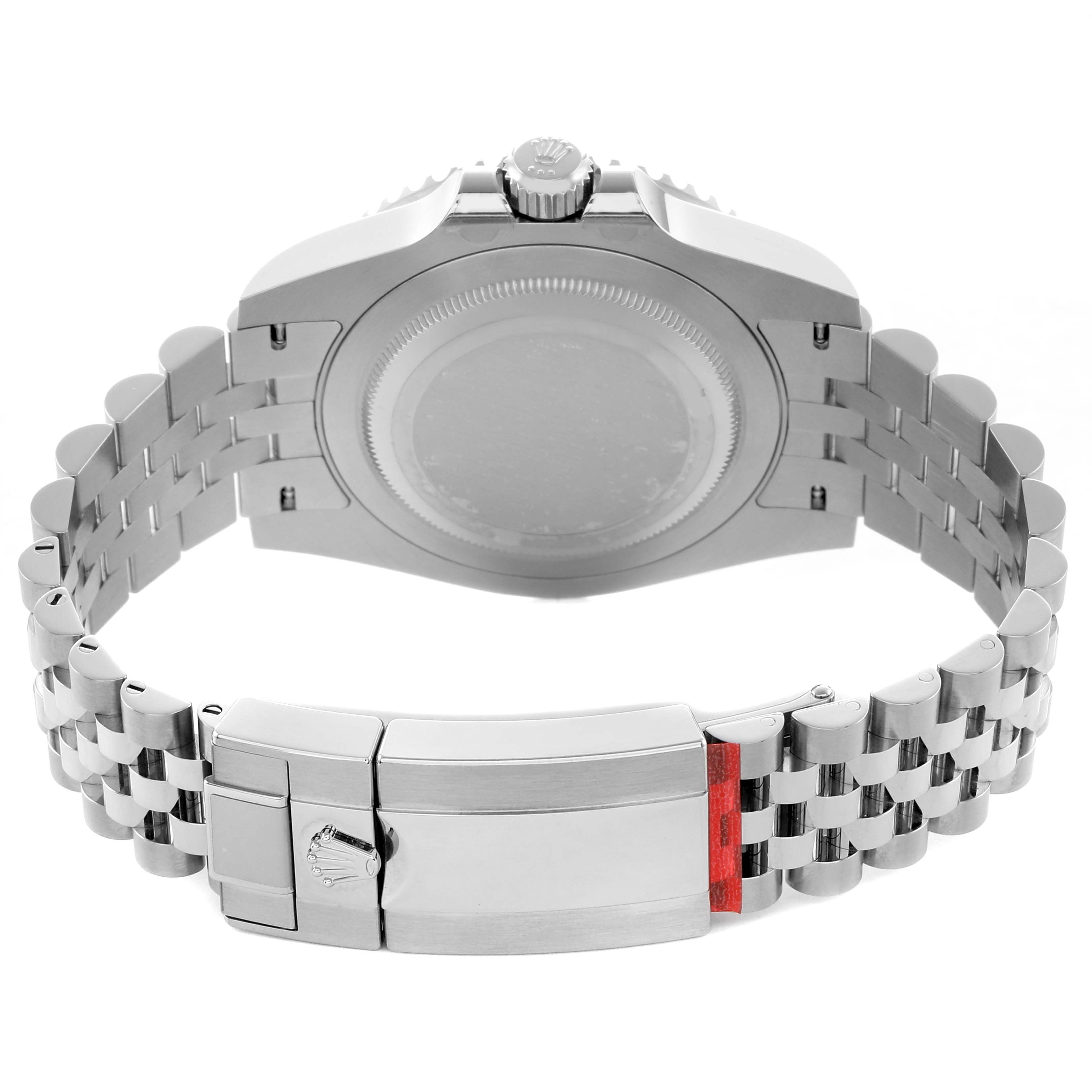 The image shows the back of a Rolex GMT-Master 126710 Men's Stainless Steel Black Dial, highlighting the clasp and bracelet.