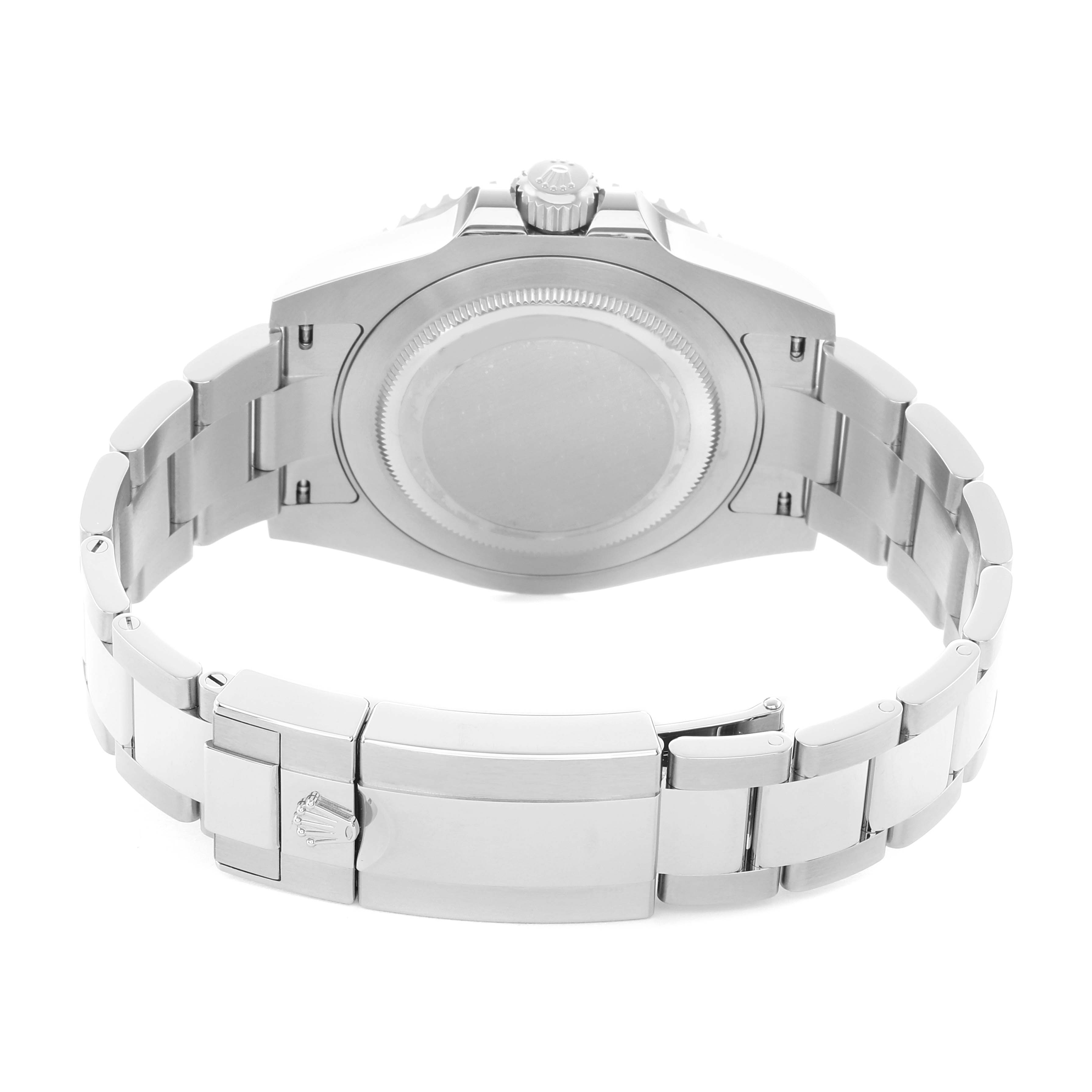 The image shows the back view of a Rolex GMT-Master 126710 Men
s Stainless Steel Black Dial watch, highlighting the case back and bracelet clasp.