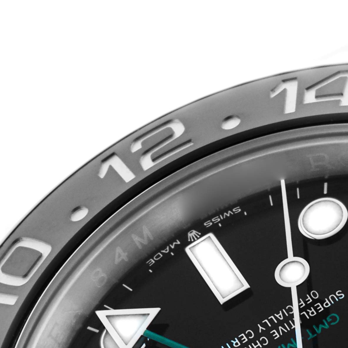The image shows a close-up of the bezel and dial of a Rolex GMT-Master 126710 Men
s Stainless Steel Black Dial, highlighting the numerals and markers.