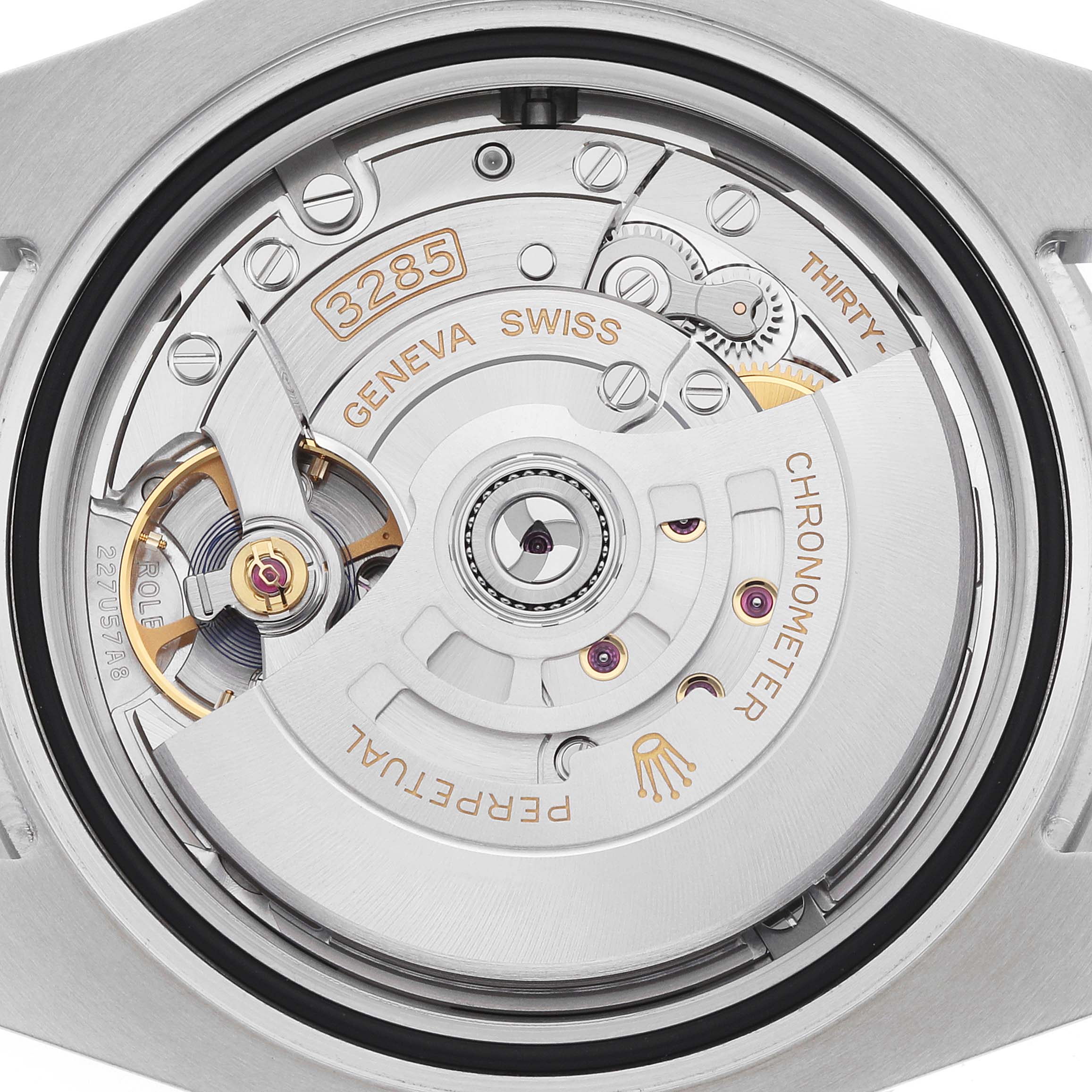 The image shows the back view of the Rolex GMT-Master 126710 Men
s Stainless Steel Black Dial, illustrating the intricate movement and rotor labeled with "3285."