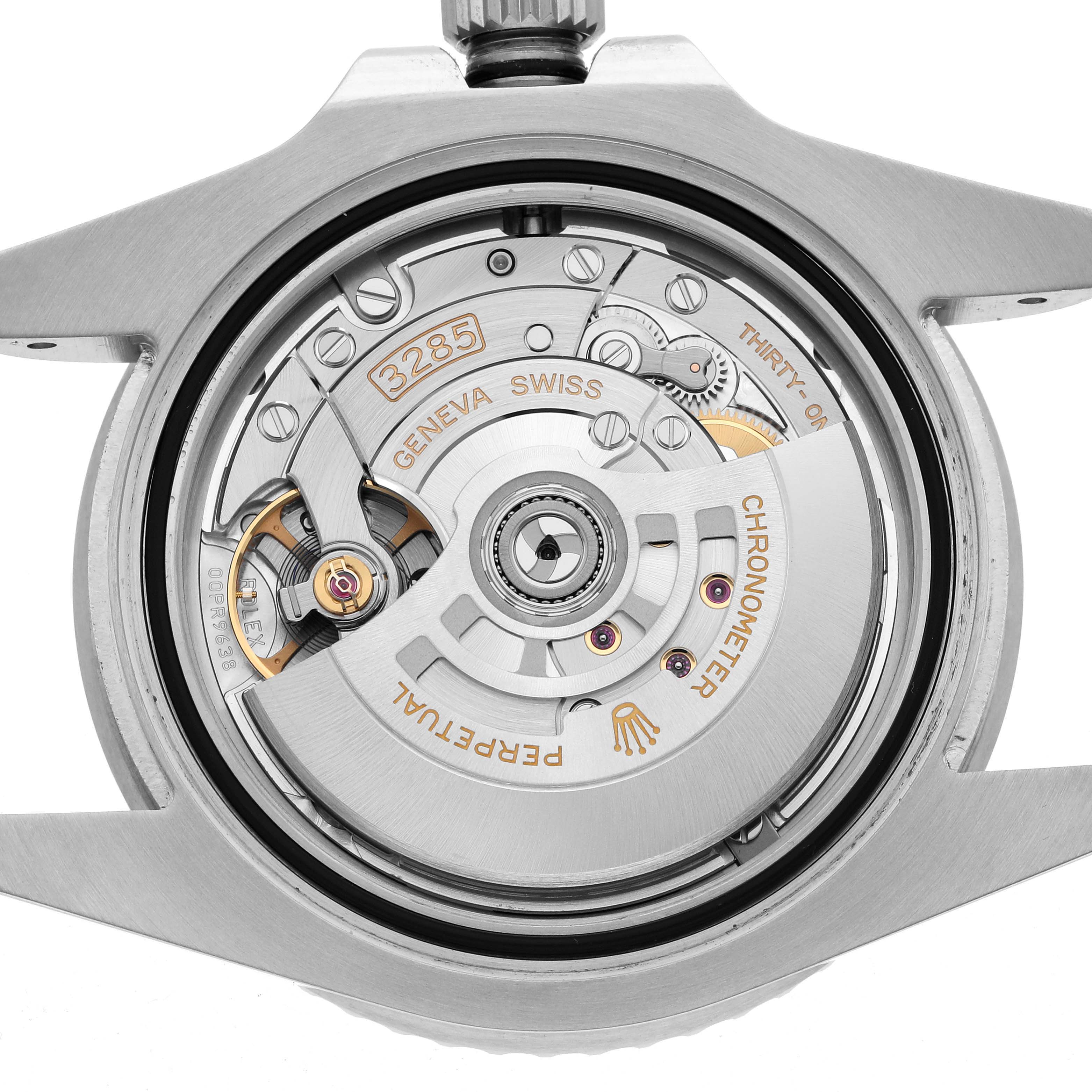 The image shows the back view of a Rolex GMT-Master 126710 Men's Stainless Steel Black Dial watch, highlighting its intricate 3285 movement mechanism.