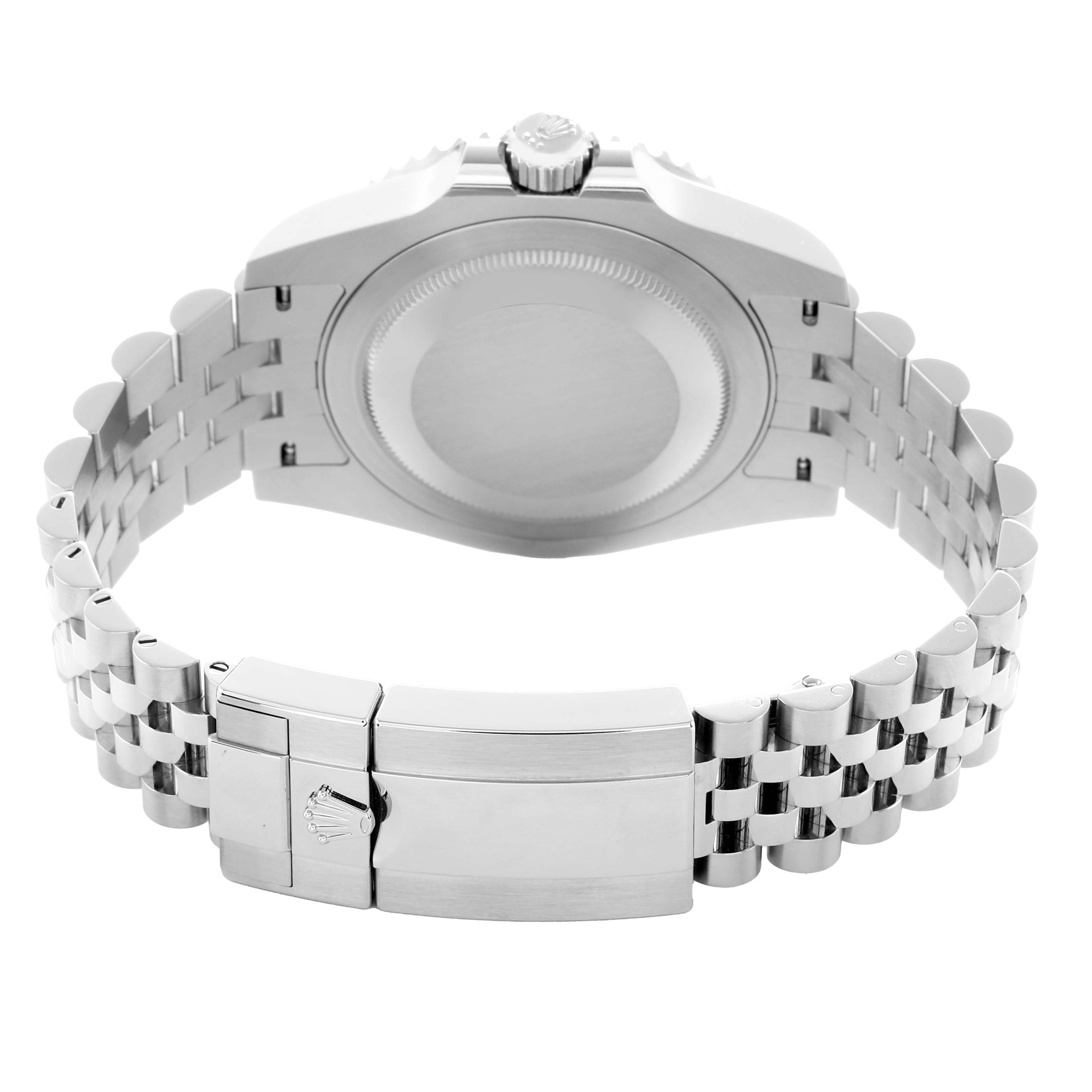 The image shows the back of a Rolex GMT-Master 126710 Men's Stainless Steel Black Dial watch, highlighting its case, crown, and Jubilee bracelet.