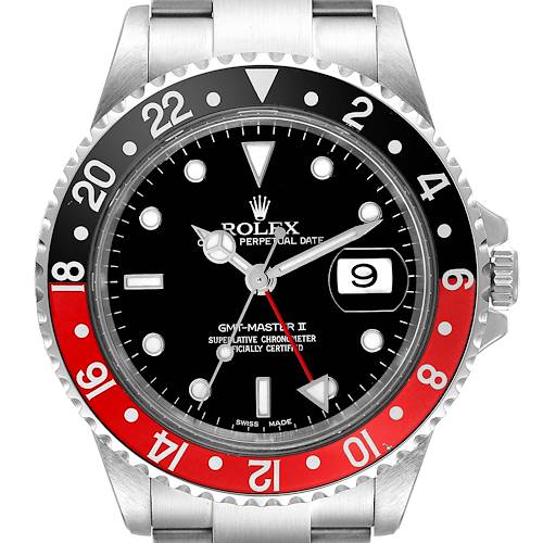 The Rolex GMT-Master watch is shown from the front, highlighting its bezel, dial, hands, and date window.