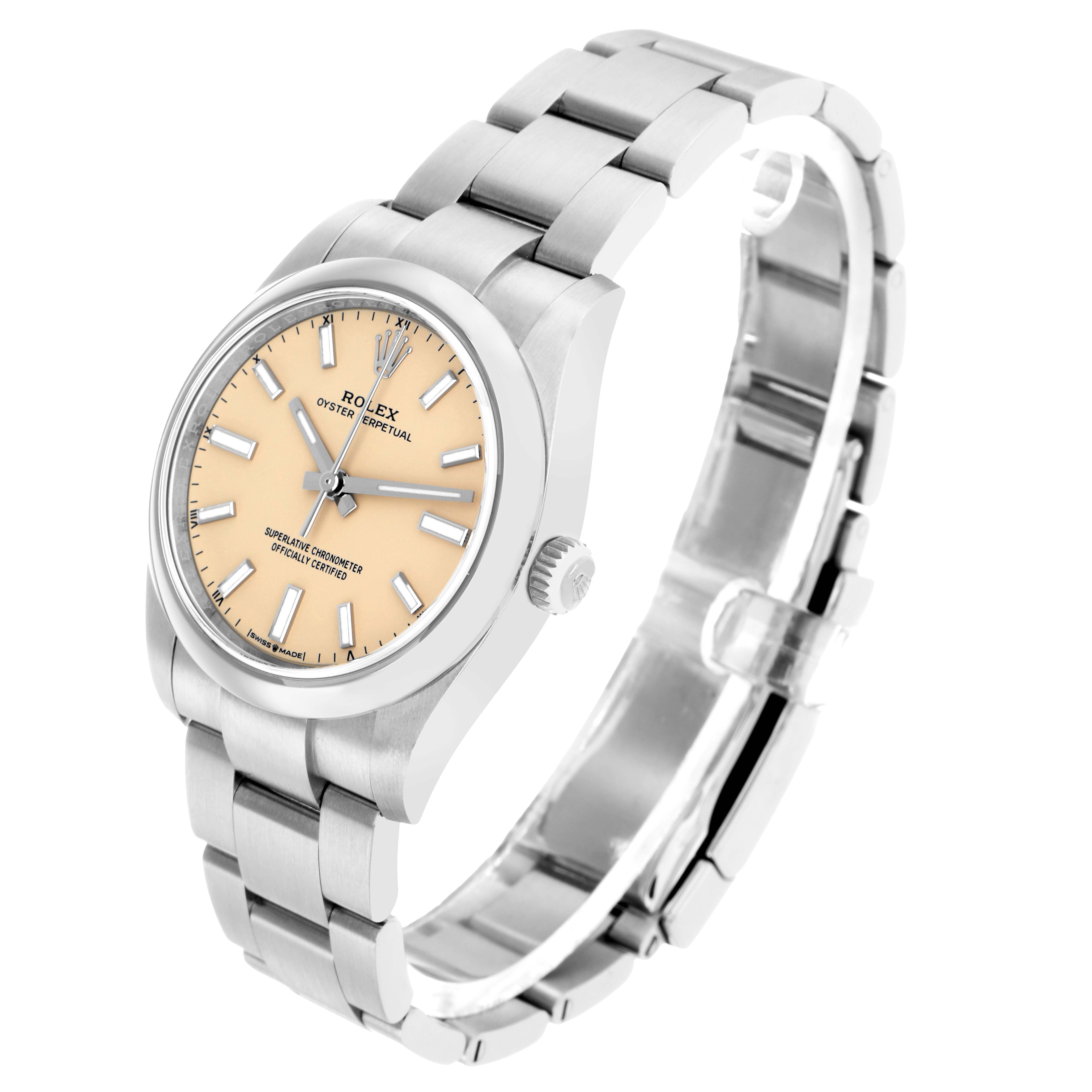 The Rolex Oyster Perpetual 124200 Men
s Stainless Steel Beige Dial watch is shown at a three-quarter angle, highlighting the face, bezel, crown, and bracelet.