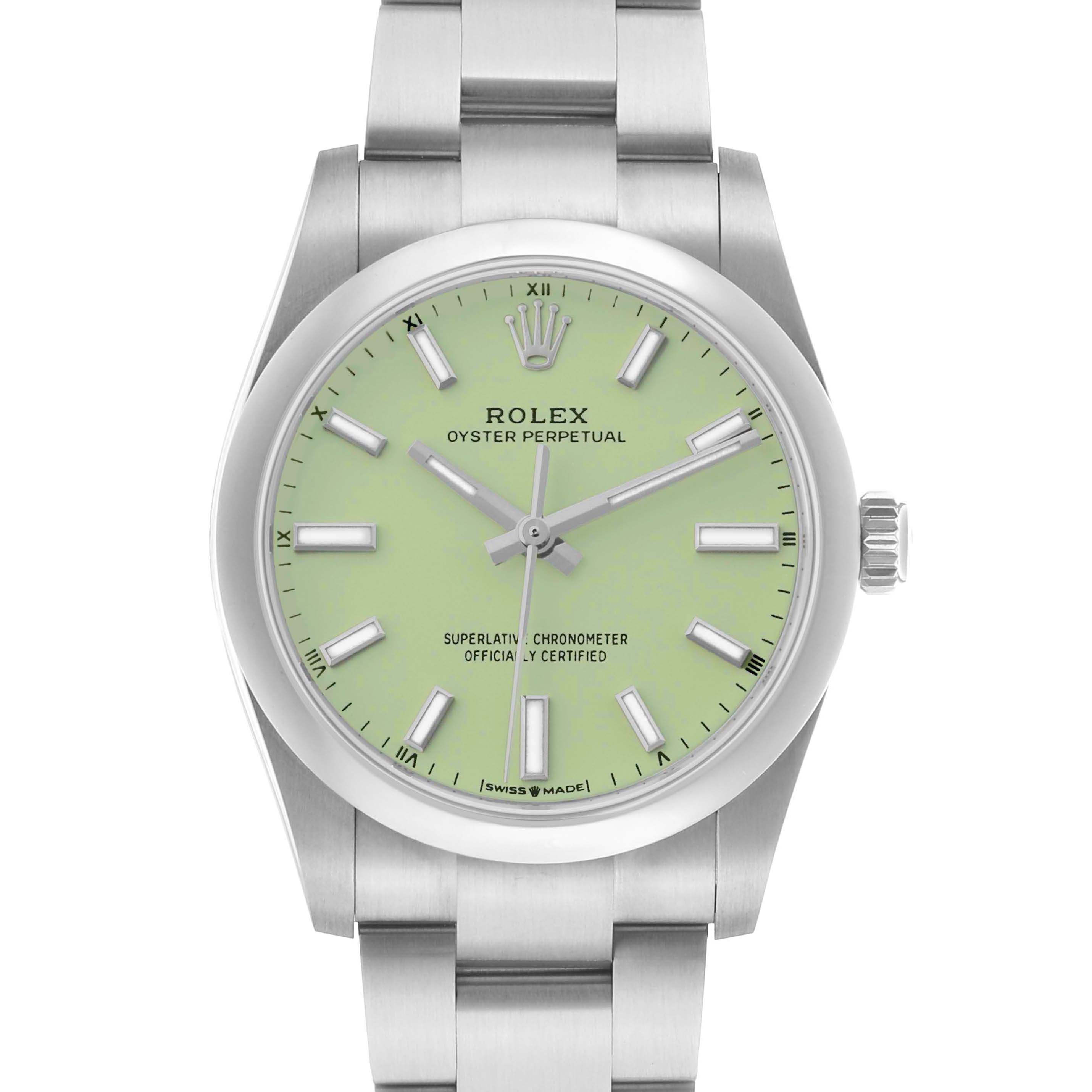 The image shows a front view of the Rolex Oyster Perpetual 124200 Men
s Stainless Steel Green Dial watch, featuring its dial, bezel, crown, and bracelet.