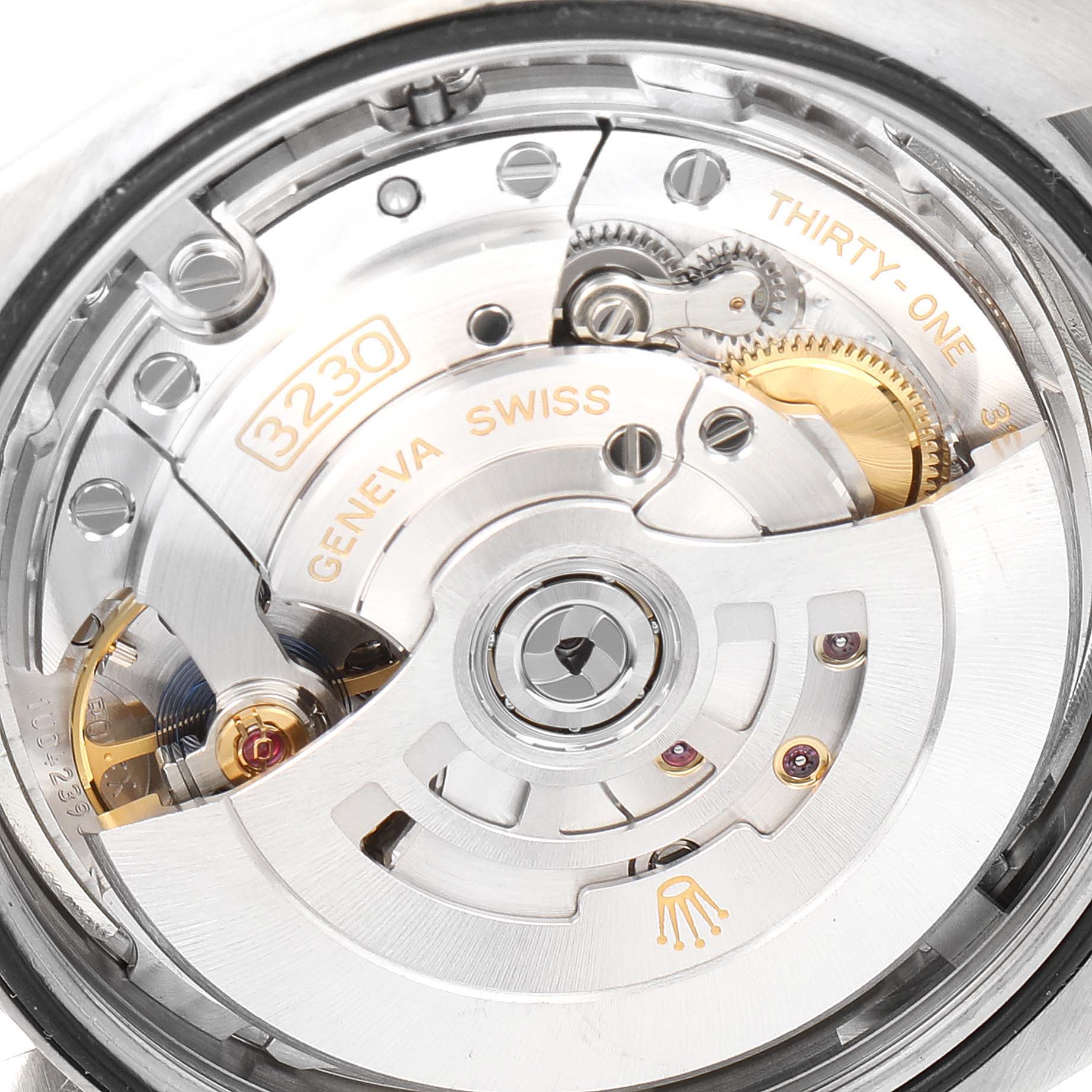 The image shows the internal mechanism and movement parts of a Rolex Oyster Perpetual 124300 Men
s Stainless Steel Silver Dial 124300 Men
s Stainless Steel Silver Dial watch, viewed from the back.