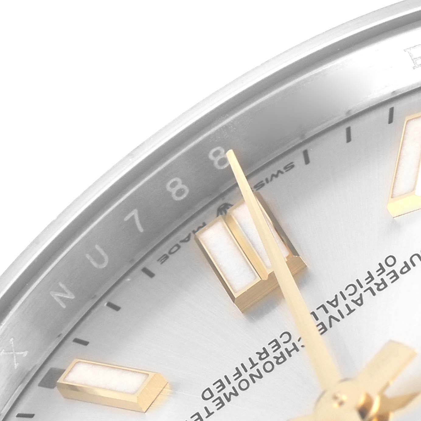 This image shows a close-up of the dial and hour markers of a Rolex Oyster Perpetual 124300 Men
s Stainless Steel Silver Dial 124300 Men
s Stainless Steel Silver Dial watch.