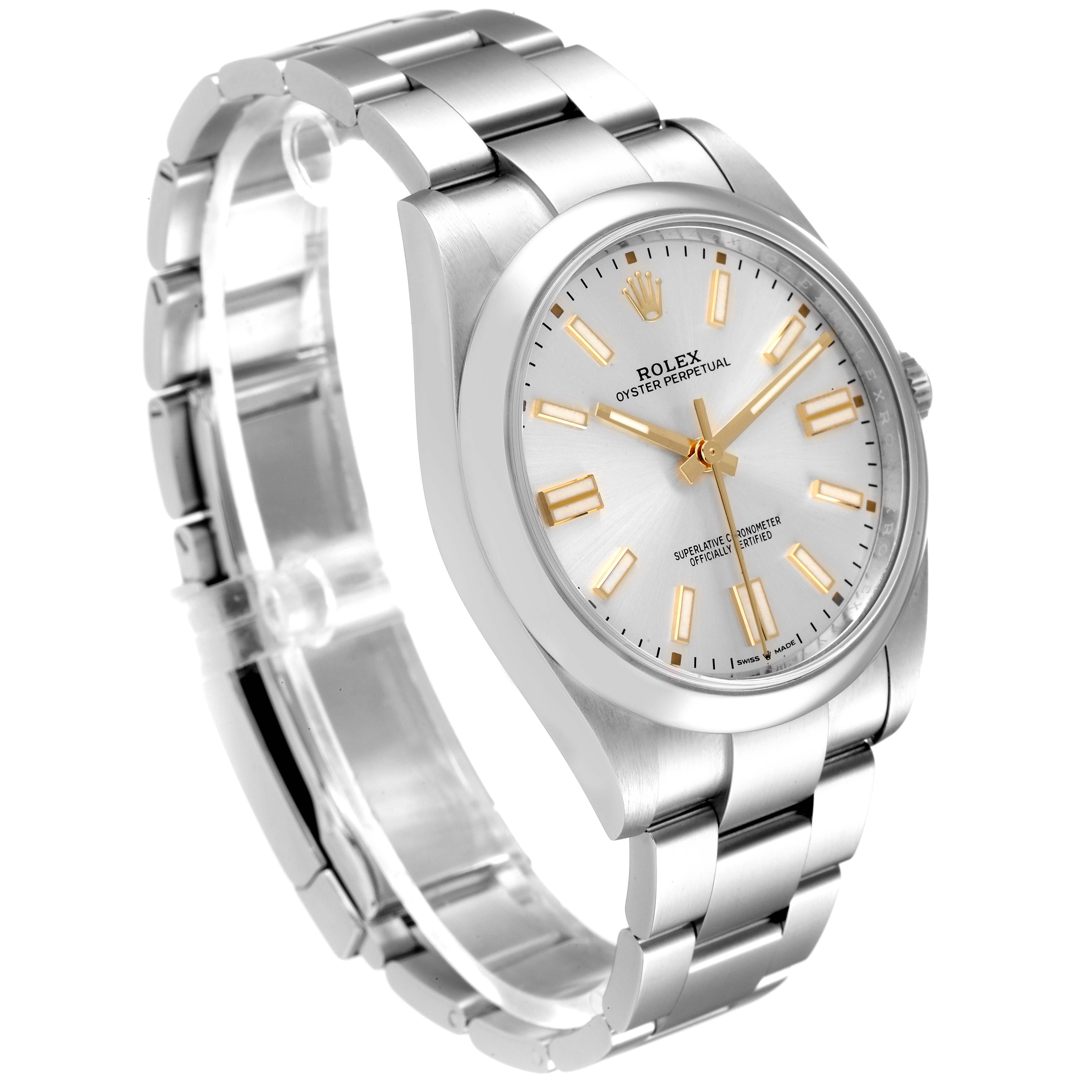 The Rolex Oyster Perpetual 124300 Men
s Stainless Steel Silver Dial 124300 Men
s Stainless Steel Silver Dial watch is shown at an angle displaying the full face, bezel, and part of the bracelet.