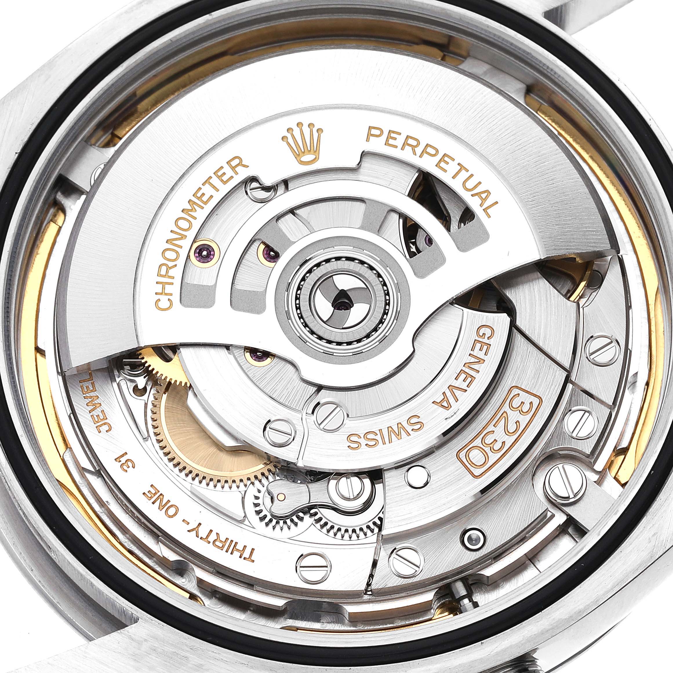 The image shows the internal movement mechanism of a Rolex Oyster Perpetual 124300 Men
s Stainless Steel Blue Dial 124300 Men
s Stainless Steel Blue Dial watch from a close-up, top-down angle.