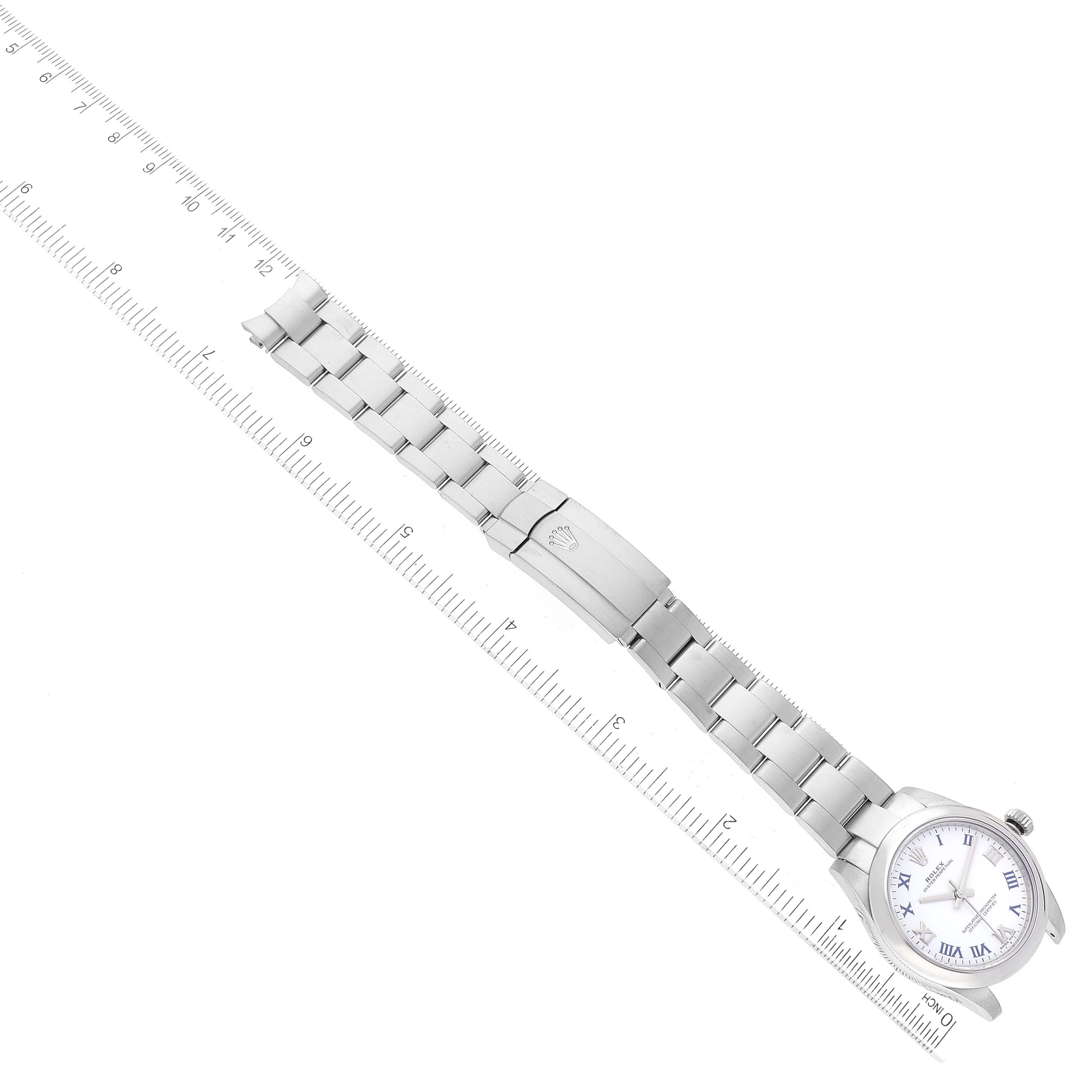 The image shows a Rolex Mid-Size 177200 Women's Stainless Steel White Dial 177200 Women's Stainless Steel White Dial watch from a top-down angle, displaying the face, bracelet, and clasp.