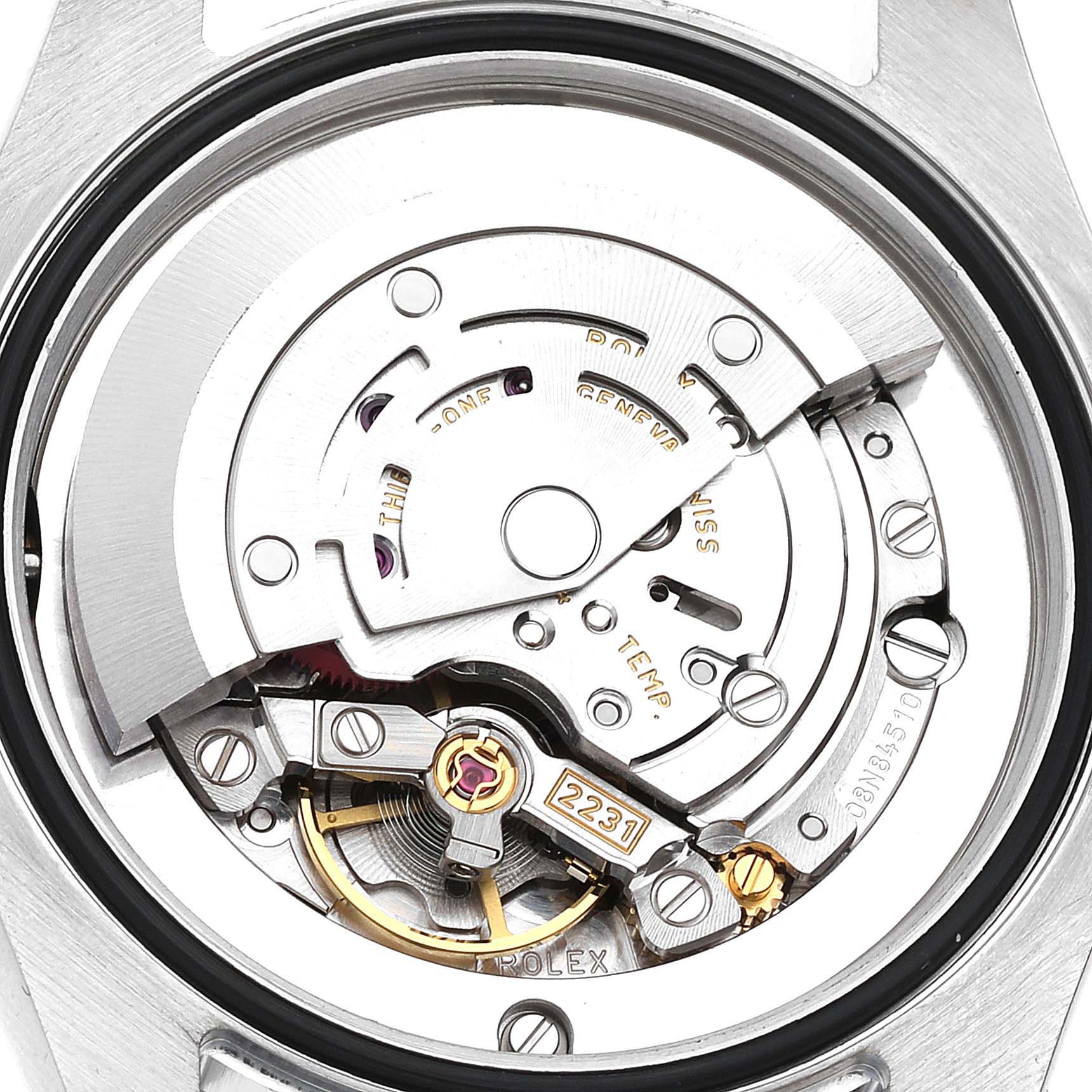 This image shows the internal movement mechanism of a Mid-Size Rolex watch, viewed from the back.