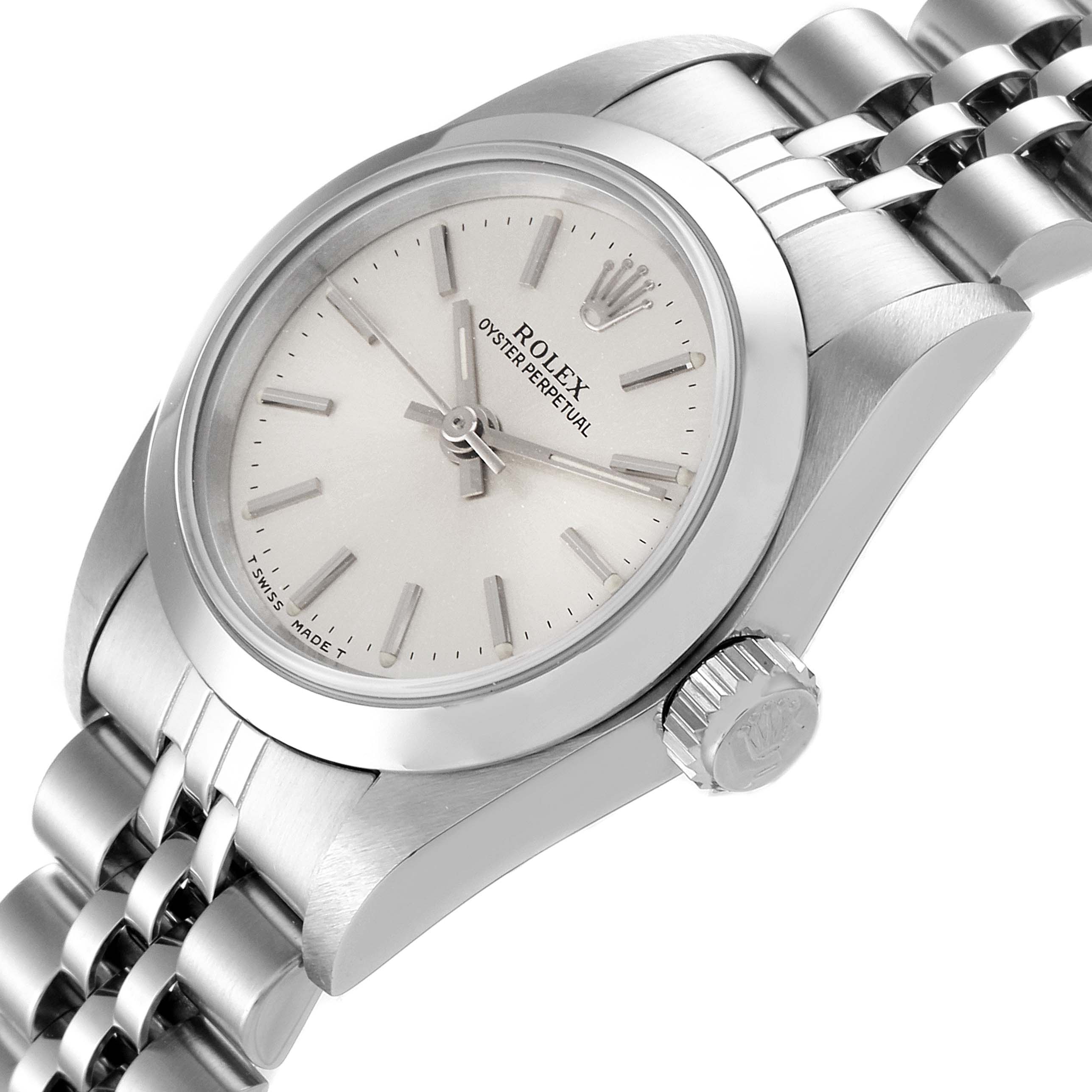 This image shows a Rolex Oyster Perpetual 67180 Women's Stainless Steel Silver Dial 67180 Women's Stainless Steel Silver Dial watch at an angle highlighting the face, bezel, crown, and part of the bracelet.