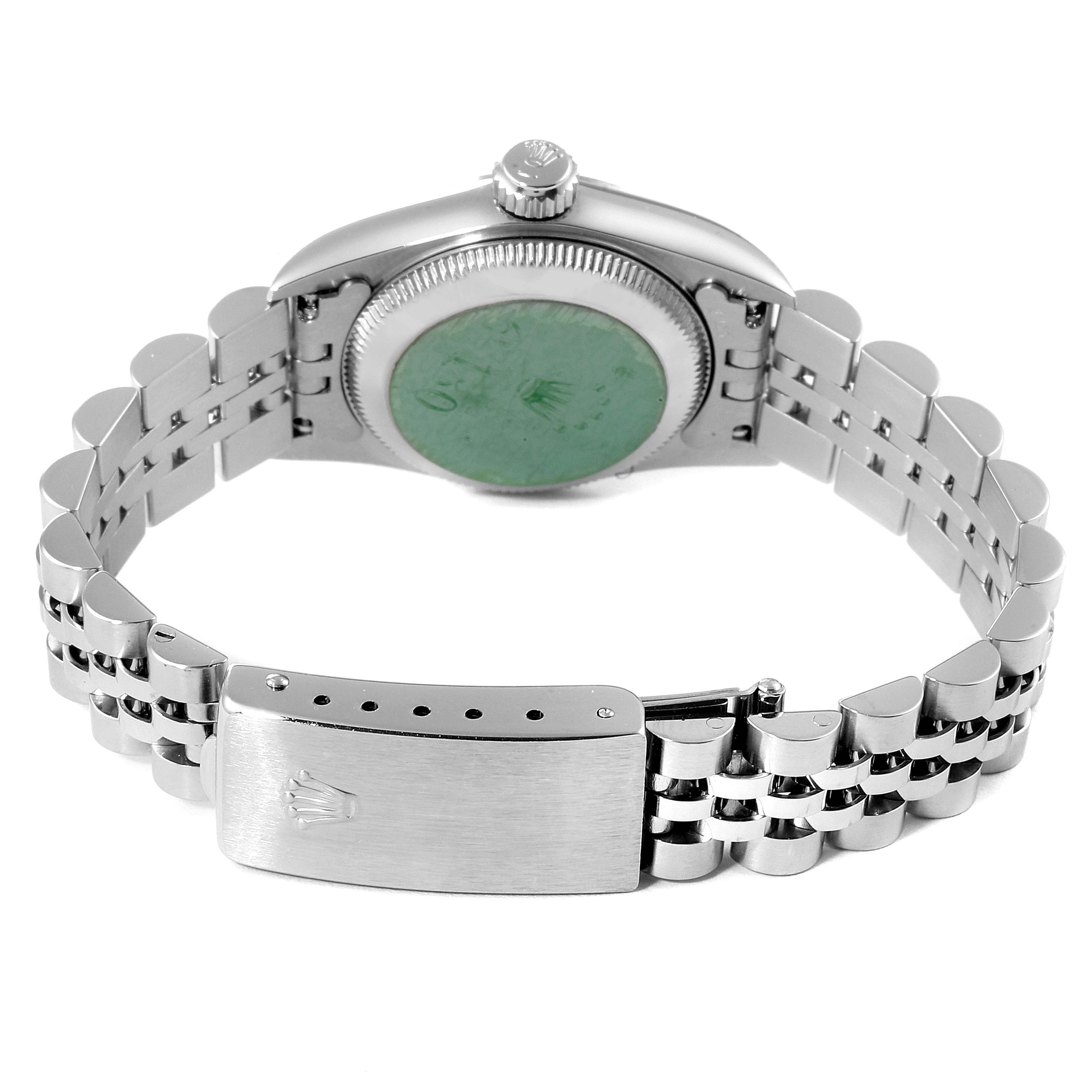 This image shows the rear angle of a Rolex Oyster Perpetual 67180 Women's Stainless Steel Silver Dial 67180 Women's Stainless Steel Silver Dial watch, highlighting the bracelet and case back.