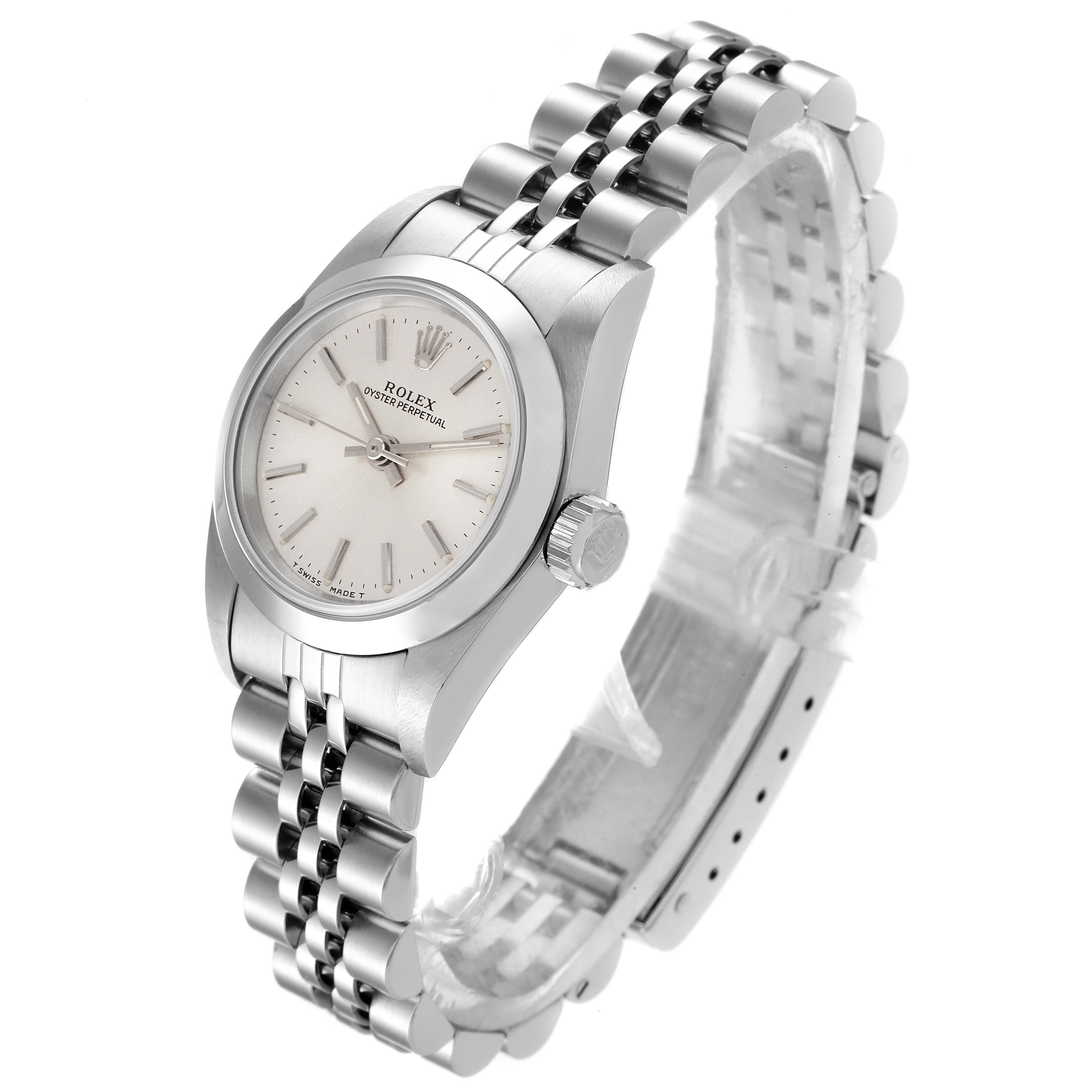 The Rolex Oyster Perpetual 67180 Women's Stainless Steel Silver Dial 67180 Women's Stainless Steel Silver Dial watch is shown at a 3/4 angle, displaying the face, bezel, crown, and part of the bracelet.