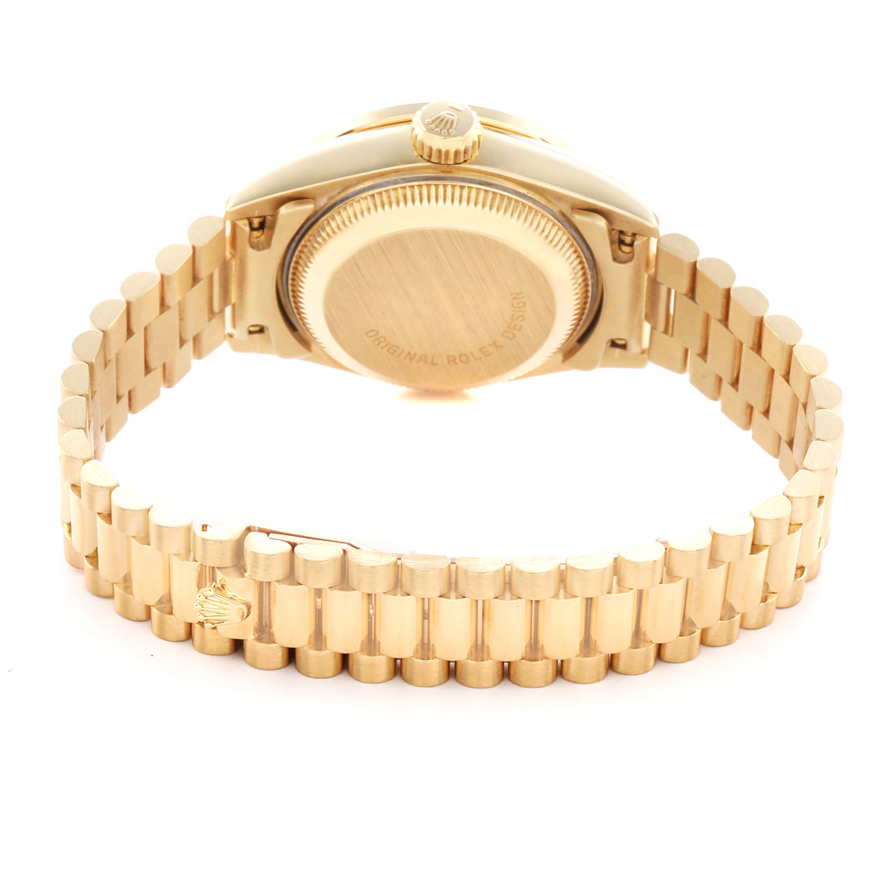 The image shows the back and bracelet of a Rolex President 69068 Women
s Yellow Gold Champagne Dial watch, highlighting the gold case and clasp.