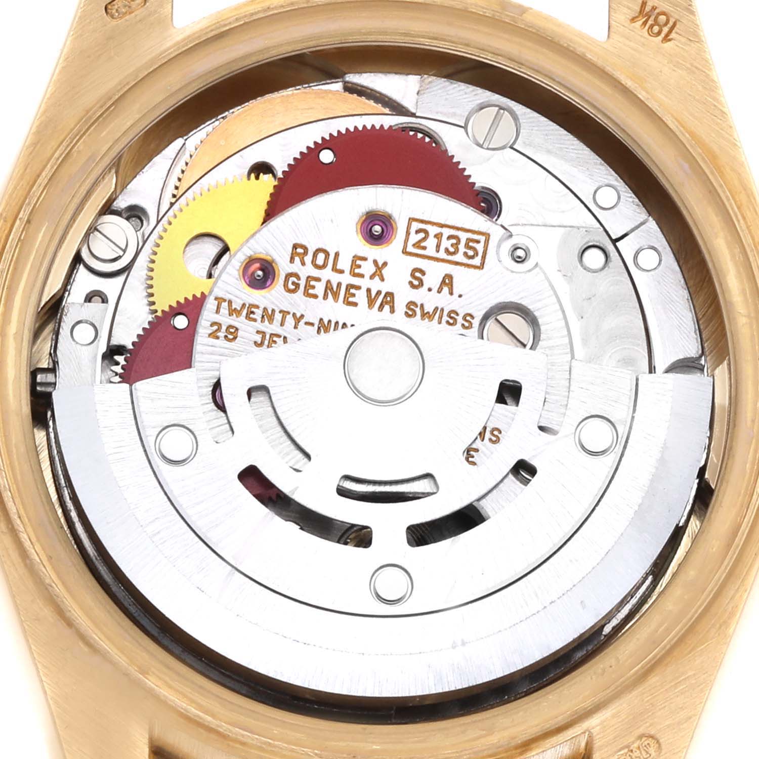 The image shows the movement of a Rolex President 69068 Women
s Yellow Gold Champagne Dial model from a top view, highlighting gears and inscriptions.
