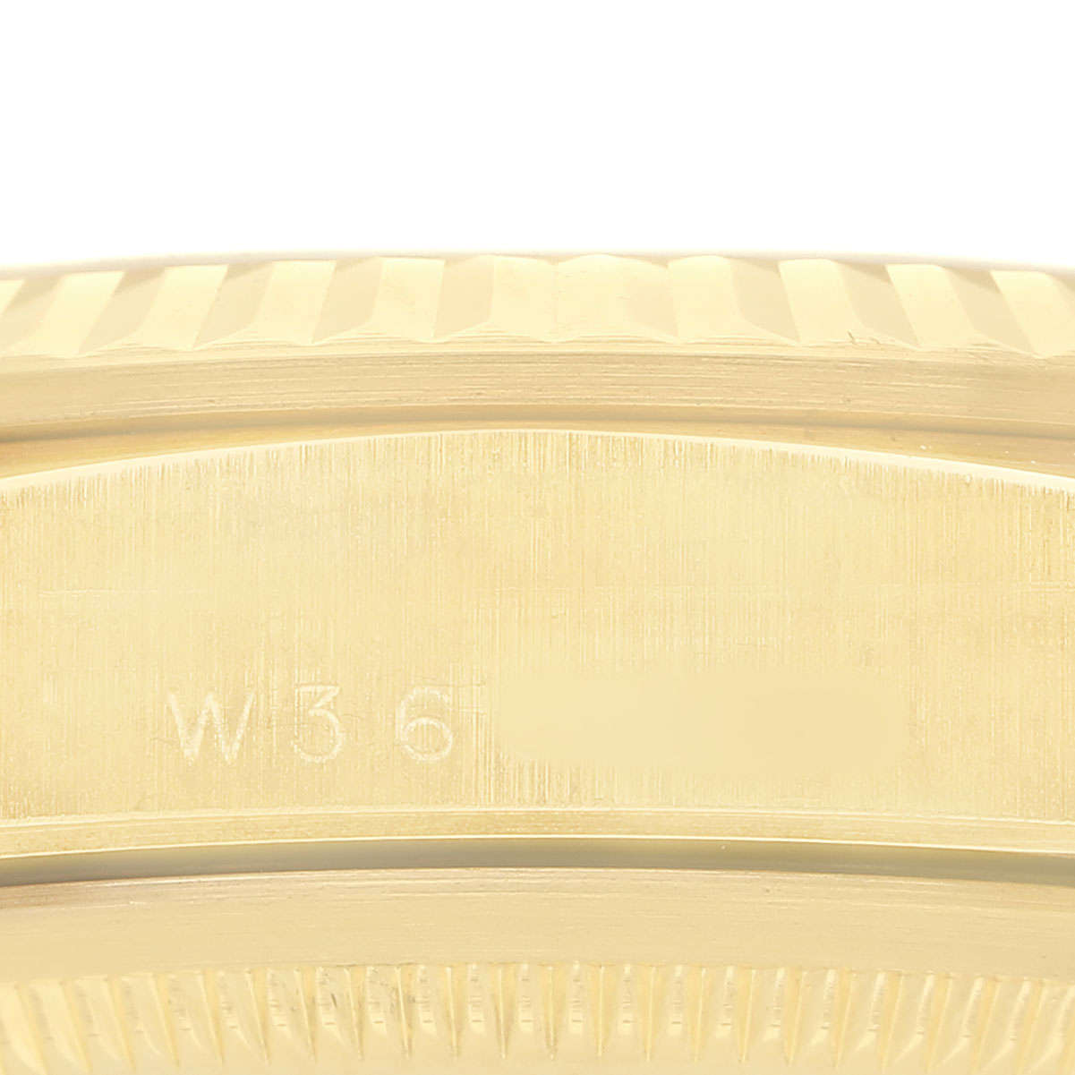 The image shows a side view of the bezel and case with engravings of the Rolex President 18238 Men's Yellow Gold Champagne Dial model.