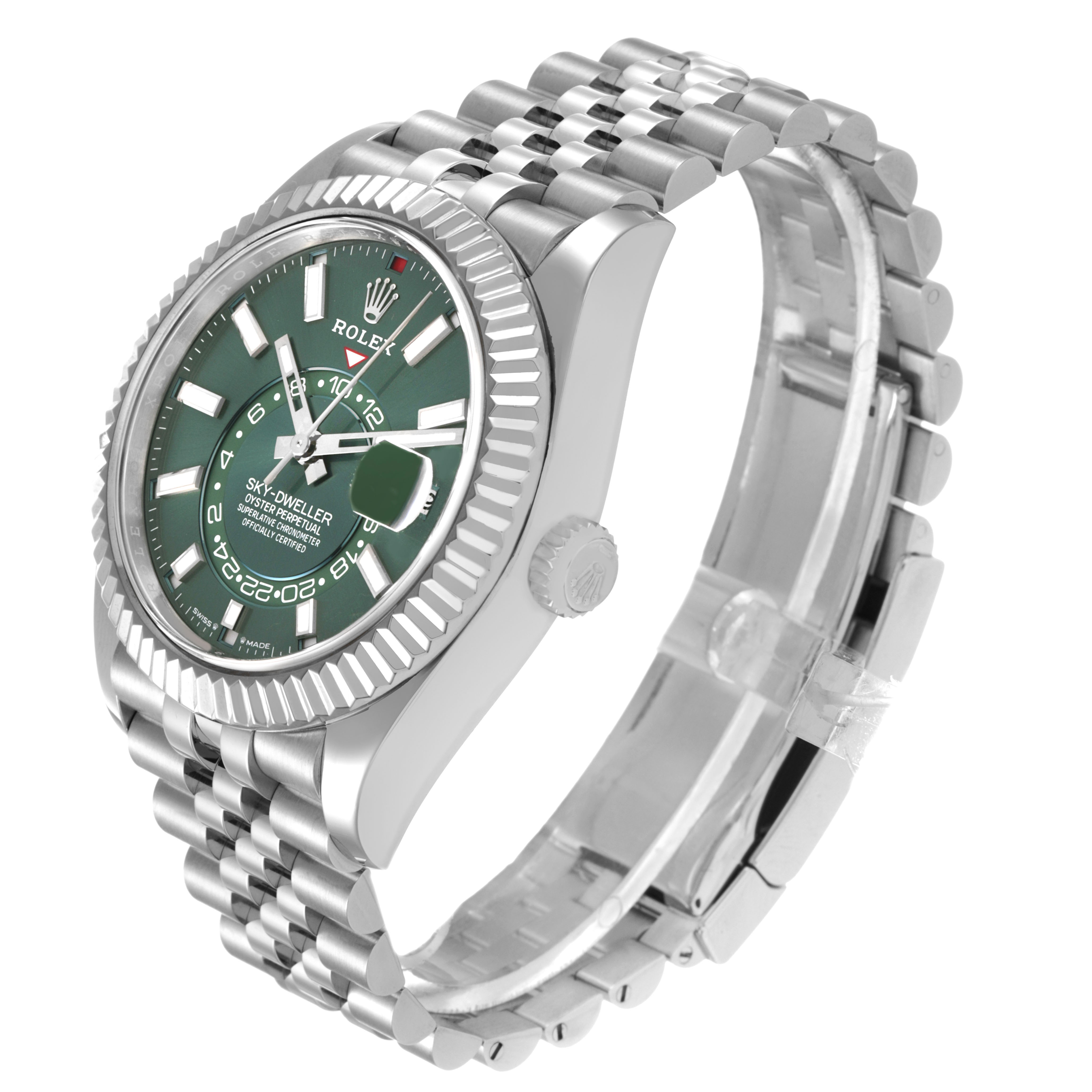 The Rolex Sky-Dweller 336934 Men's Stainless Steel Green Dial watch is shown at a three-quarter angle, highlighting the green dial, fluted bezel, and Jubilee bracelet.
