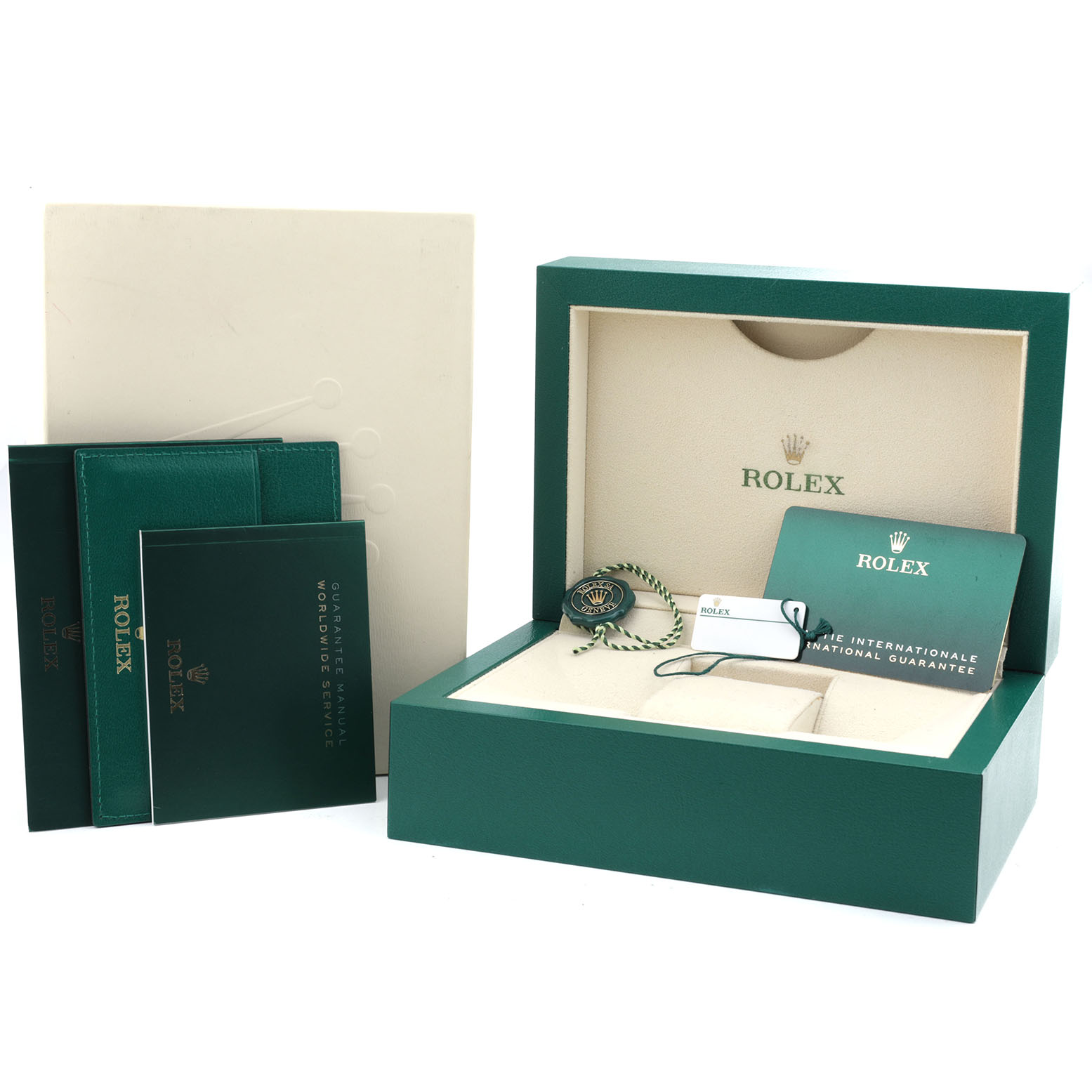 The image shows the box and accessories for a Rolex Sky-Dweller 336934 Men's Stainless Steel Green Dial, including documentation and a green leather card holder.