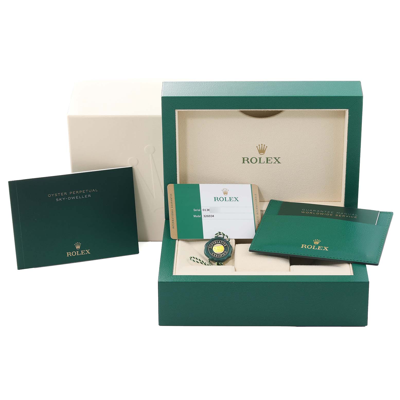 The image shows the packaging and accessories for the Rolex Sky-Dweller 326934 Men
s Stainless Steel White Dial 326934 Men
s Stainless Steel White Dial, including the box, warranty card, manual, and tag.