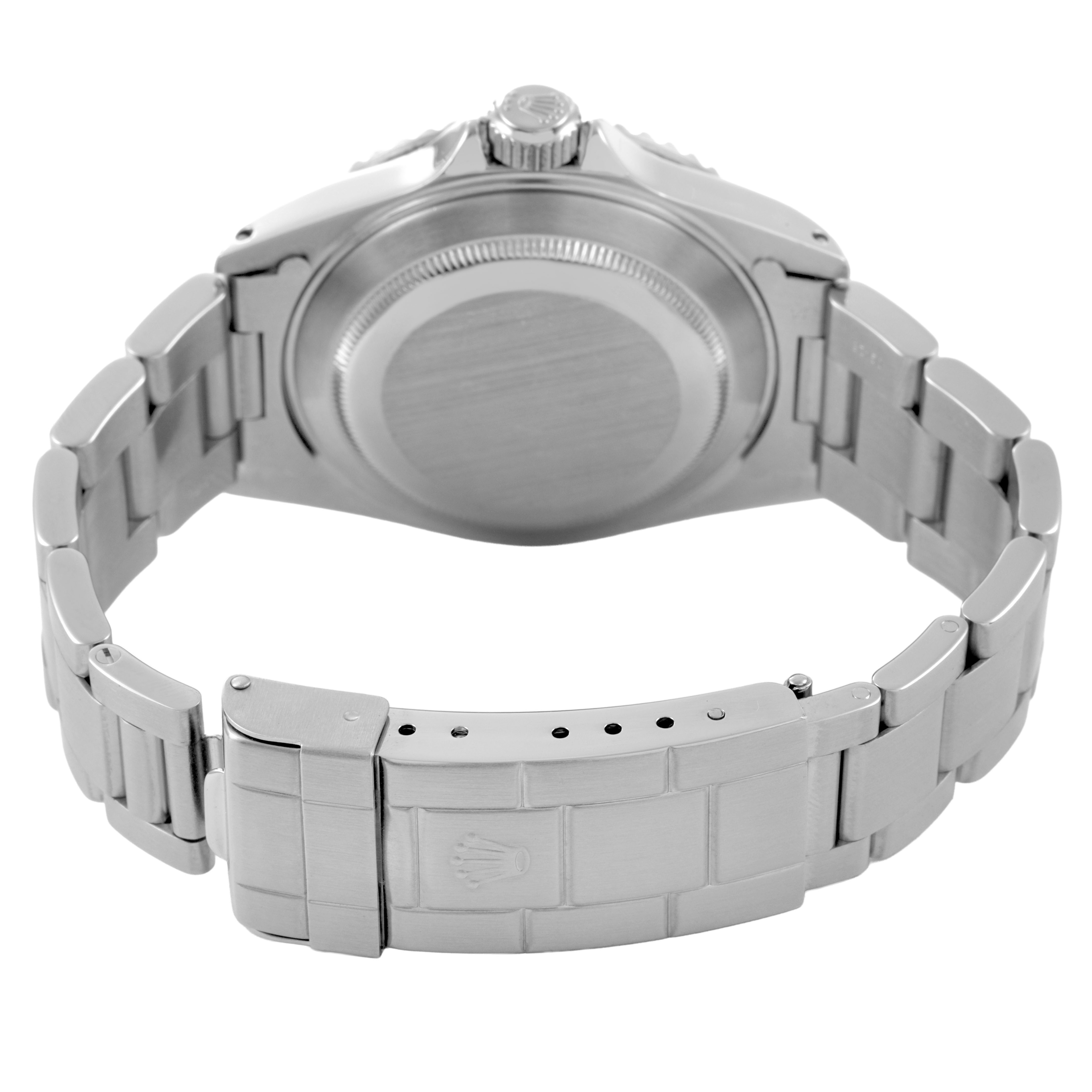 The Rolex Submariner 14060 Men's Stainless Steel Black Dial is shown from the back, displaying the case back, bracelet, and clasp.