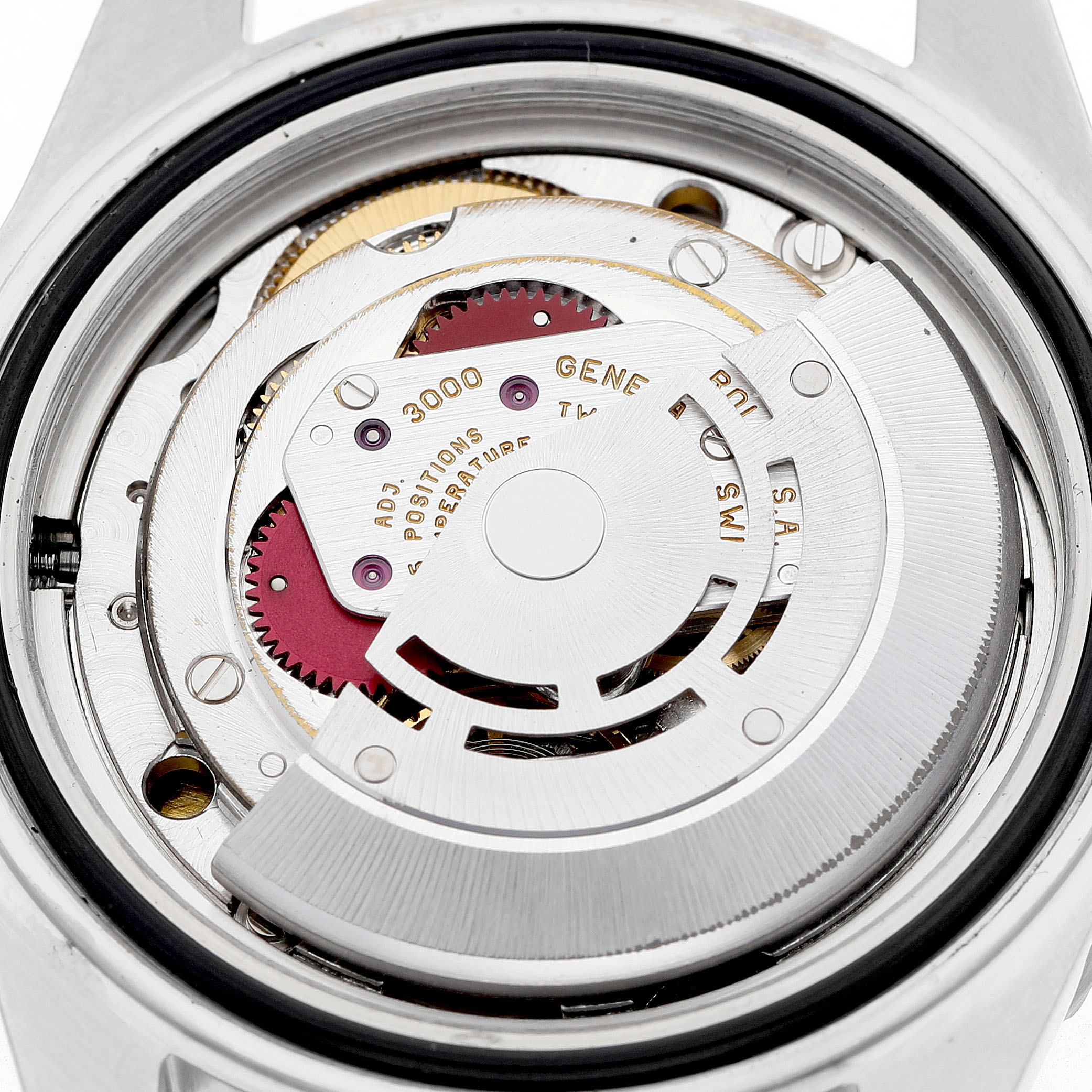 The image shows the movement of a Rolex Submariner 14060 Men's Stainless Steel Black Dial watch with visible gears and the rotor, taken from the back.