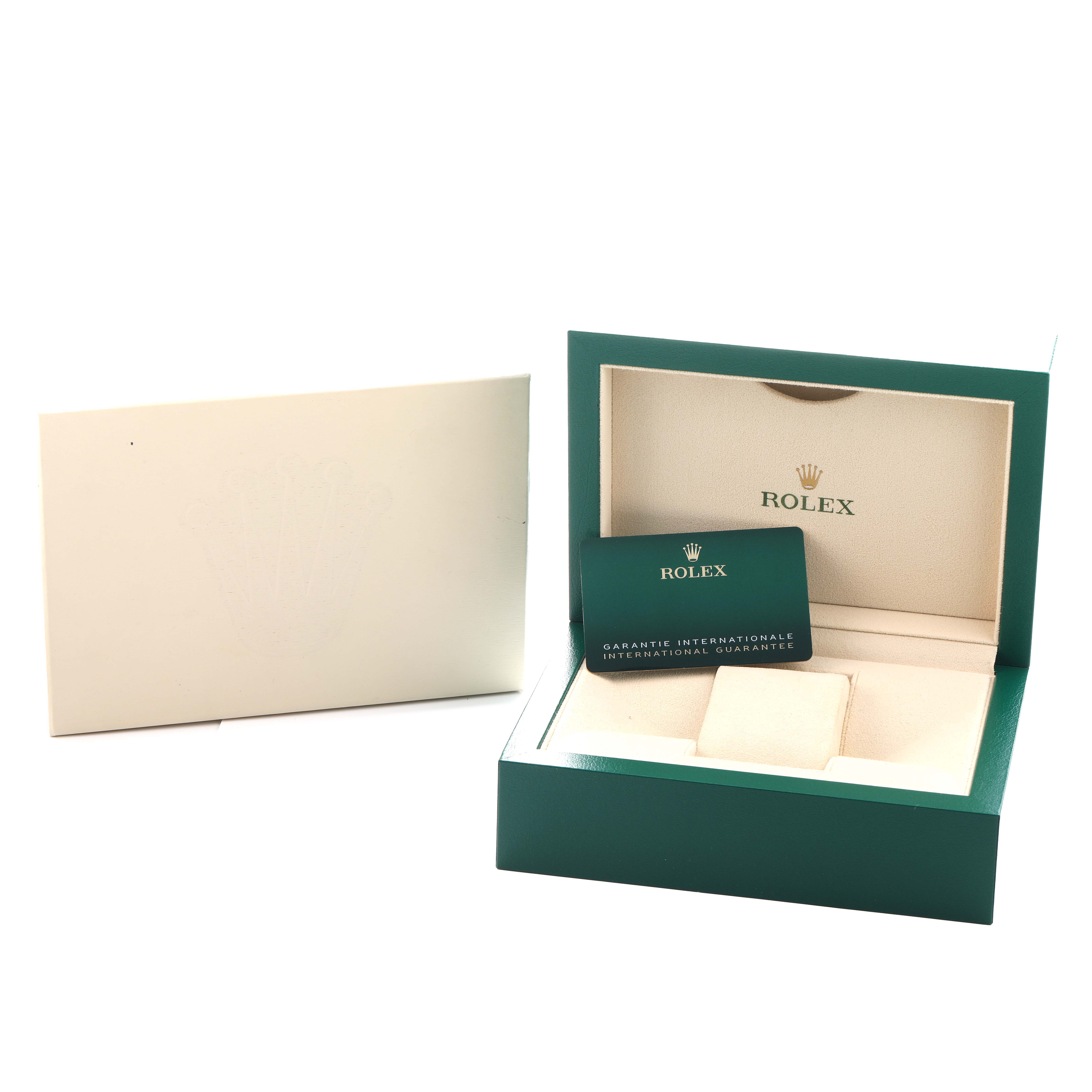 The image shows an open Rolex Submariner 126610 Men
s Stainless Steel Black Dial watch box at an angle, displaying the cardholder and storage compartment inside.