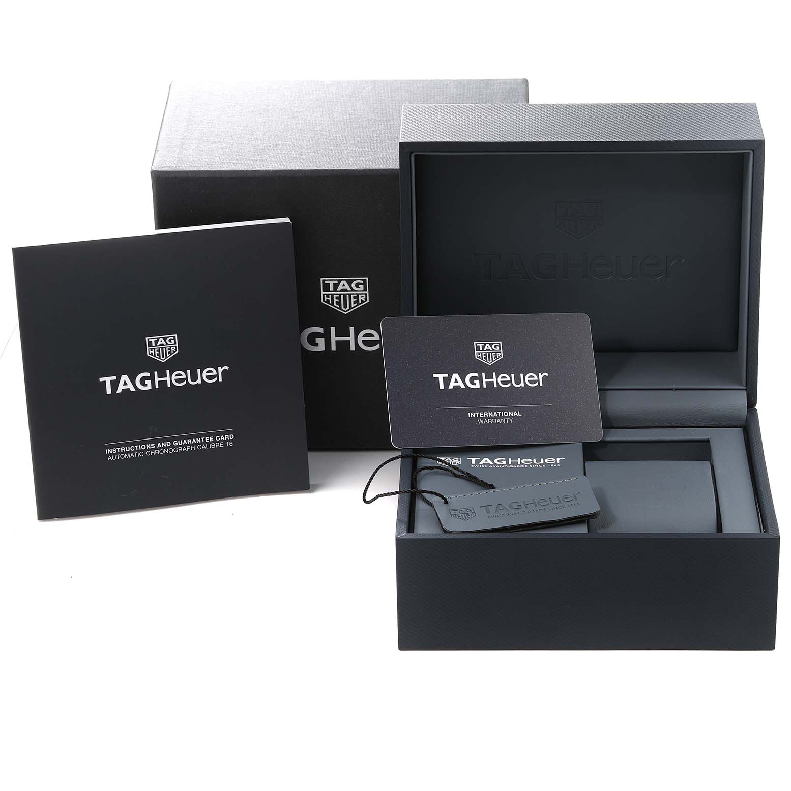 This image shows the packaging, instruction manual, and warranty card of the Tag Heuer Carrera CV2A1R.BA0799 Men's Stainless Steel Black Dial CV2A1R.BA0799 Men's Stainless Steel Black Dial watch.