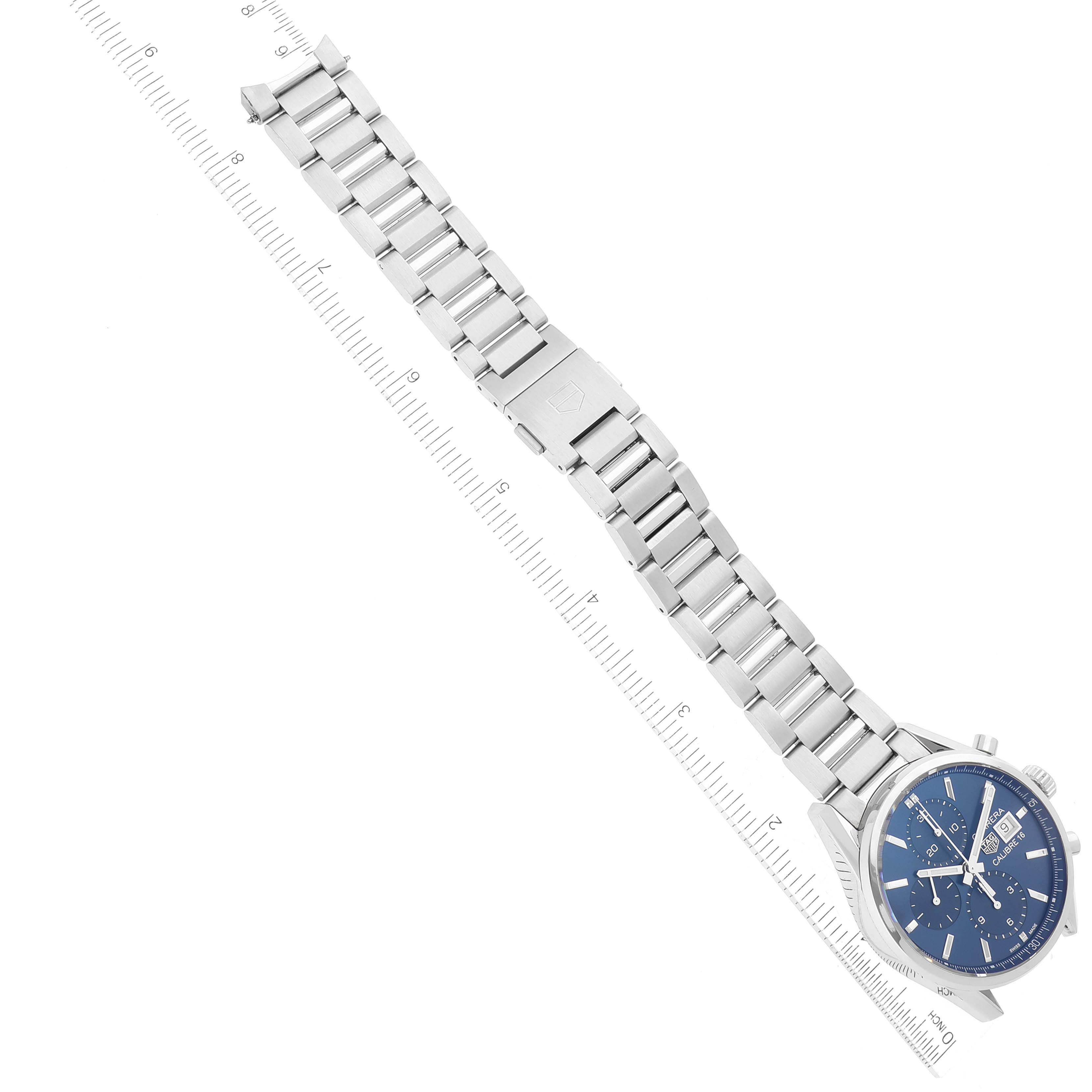 The image shows an overhead view of a Tag Heuer Carrera CBK2112.BA0715 Men's Stainless Steel Blue Dial CBK2112.BA0715 Men's Stainless Steel Blue Dial watch, highlighting its bracelet and part of its dial.