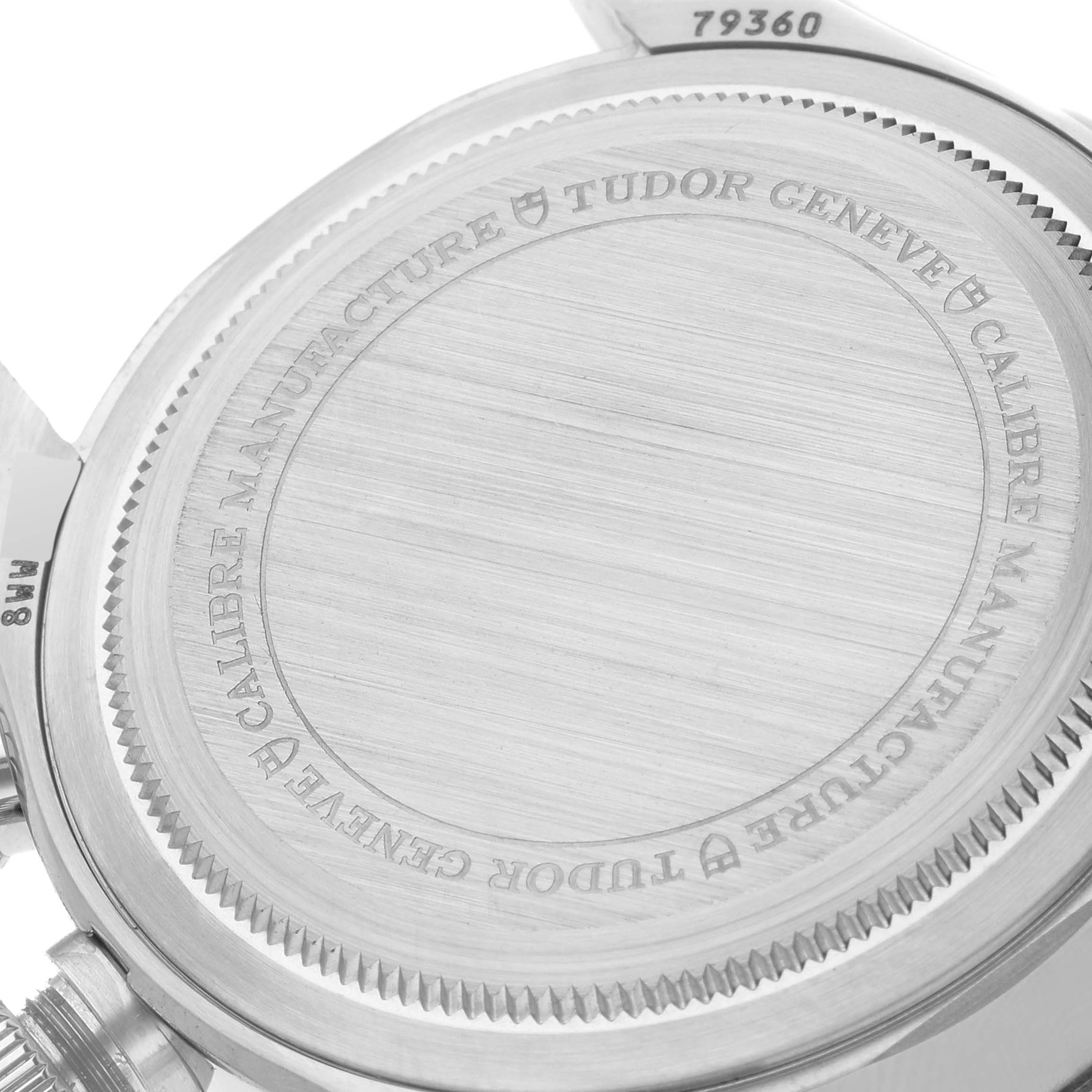 This image shows the case back of the Tudor Heritage Black Bay 79360N-0001 Men
s Stainless Steel Black Dial 79360N-0001 Men
s Stainless Steel Black Dial watch, highlighting the engraved details and serial number.