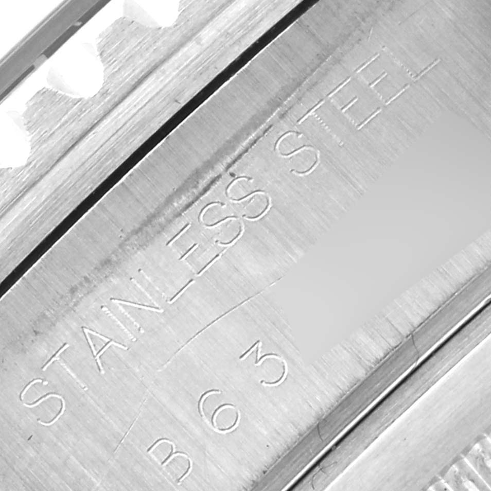 The image shows a close-up of the stainless steel engraving on a Tudor Prince 79270 Men
s Stainless Steel Black Dial 79270 Men
s Stainless Steel Black Dial watch case.