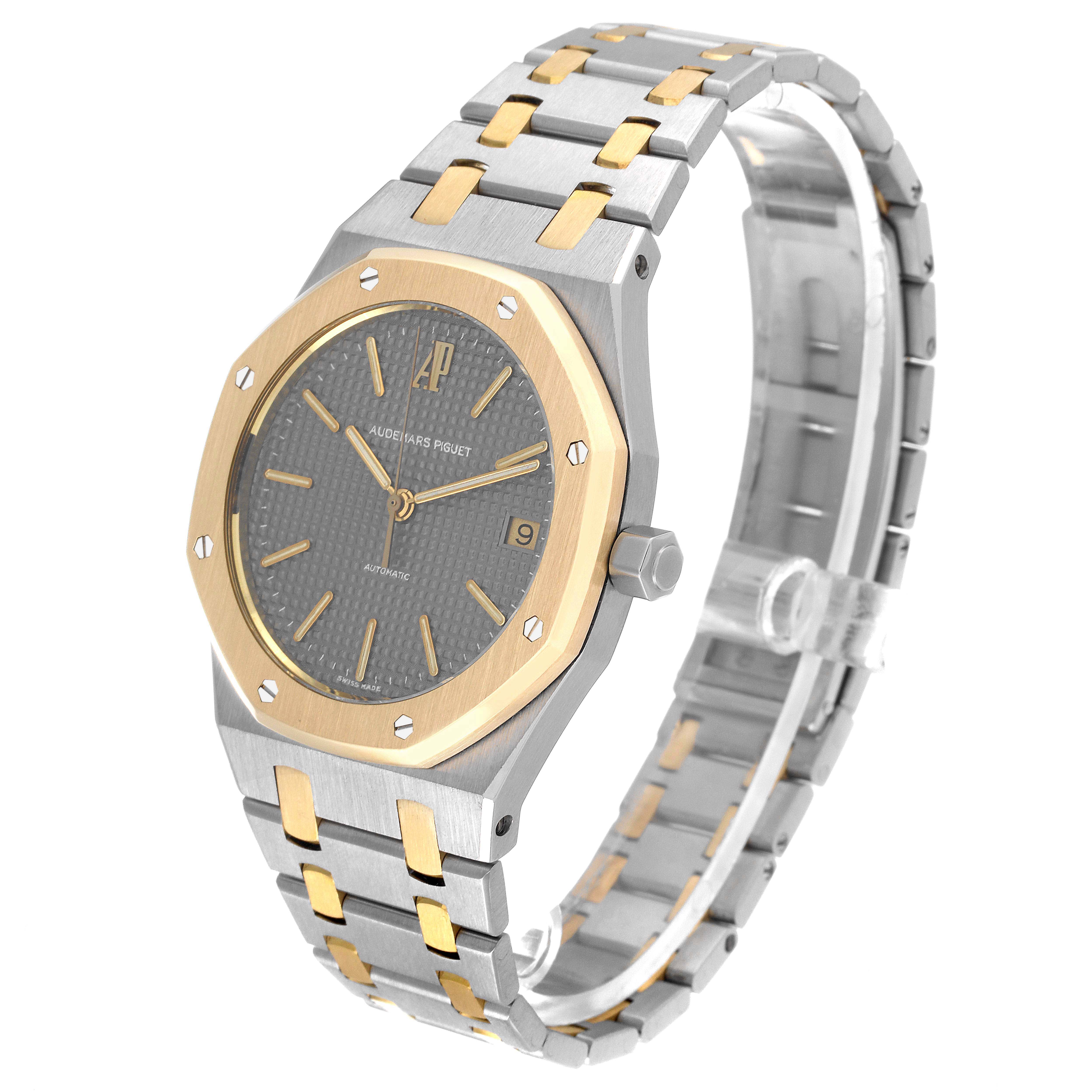 The Audemars Piguet Royal Oak 14790SA.OO.0789SA.01 Men
s Steel and Gold (two tone) Grey Dial 14790SA.OO.0789SA.01 Men
s Steel and Gold (two tone) Grey Dial watch is shown at a three-quarter angle displaying the face, bezel, and part of the bracelet.
