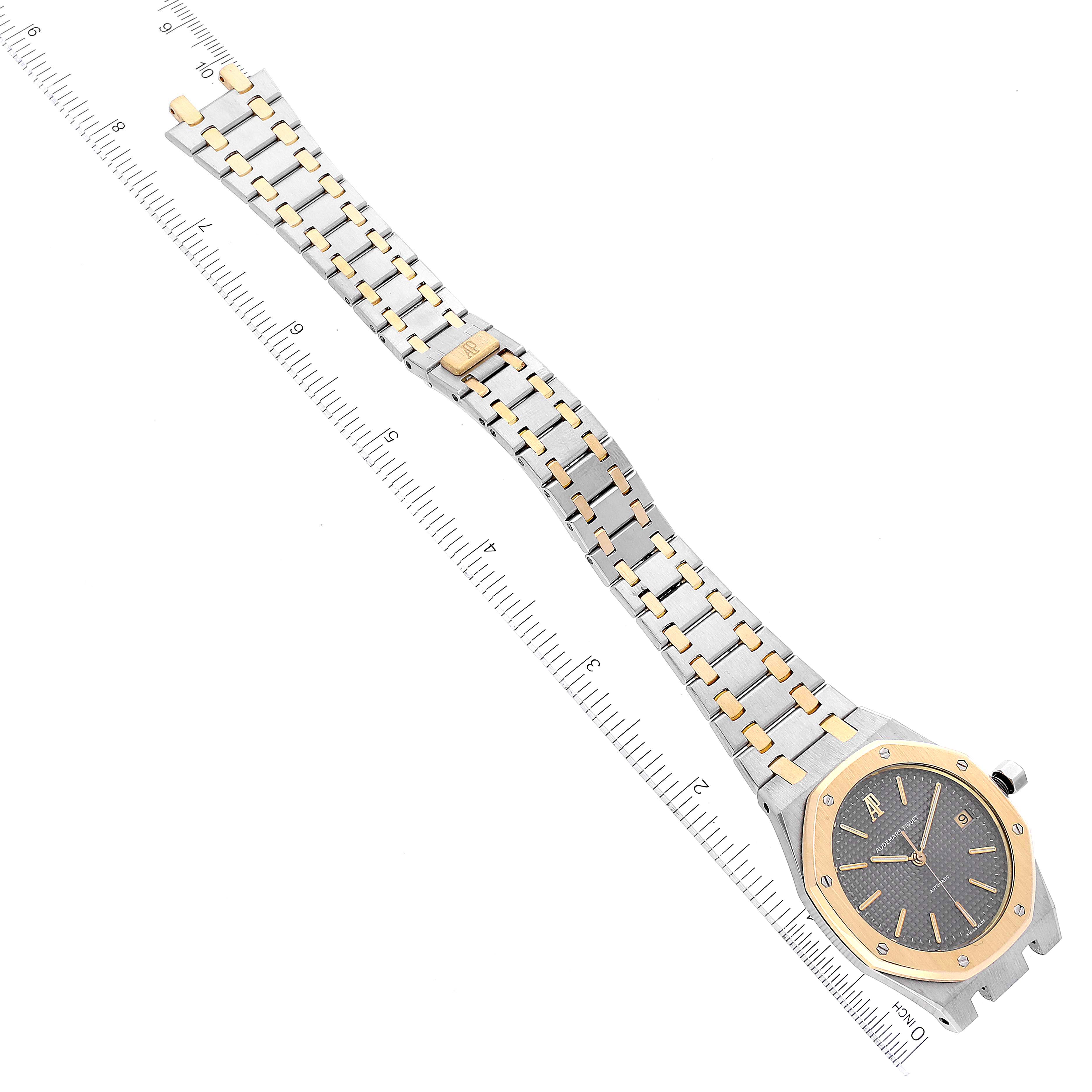 The image shows a Royal Oak model by Audemars Piguet, displaying the face, bezel, and bracelet from a top-down angle.