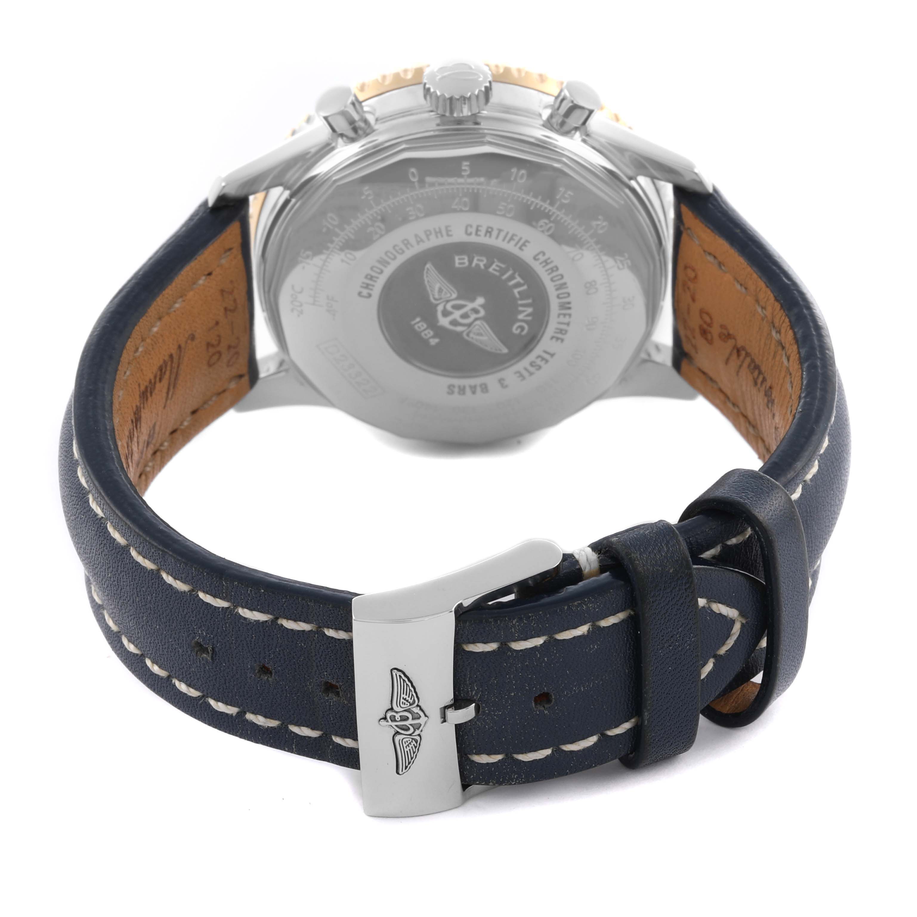 The image shows the back of the Breitling Navitimer D23322 Men
s Stainless Steel Black Dial D23322 Men
s Stainless Steel Black Dial watch, highlighting the case back and leather strap with a buckle.