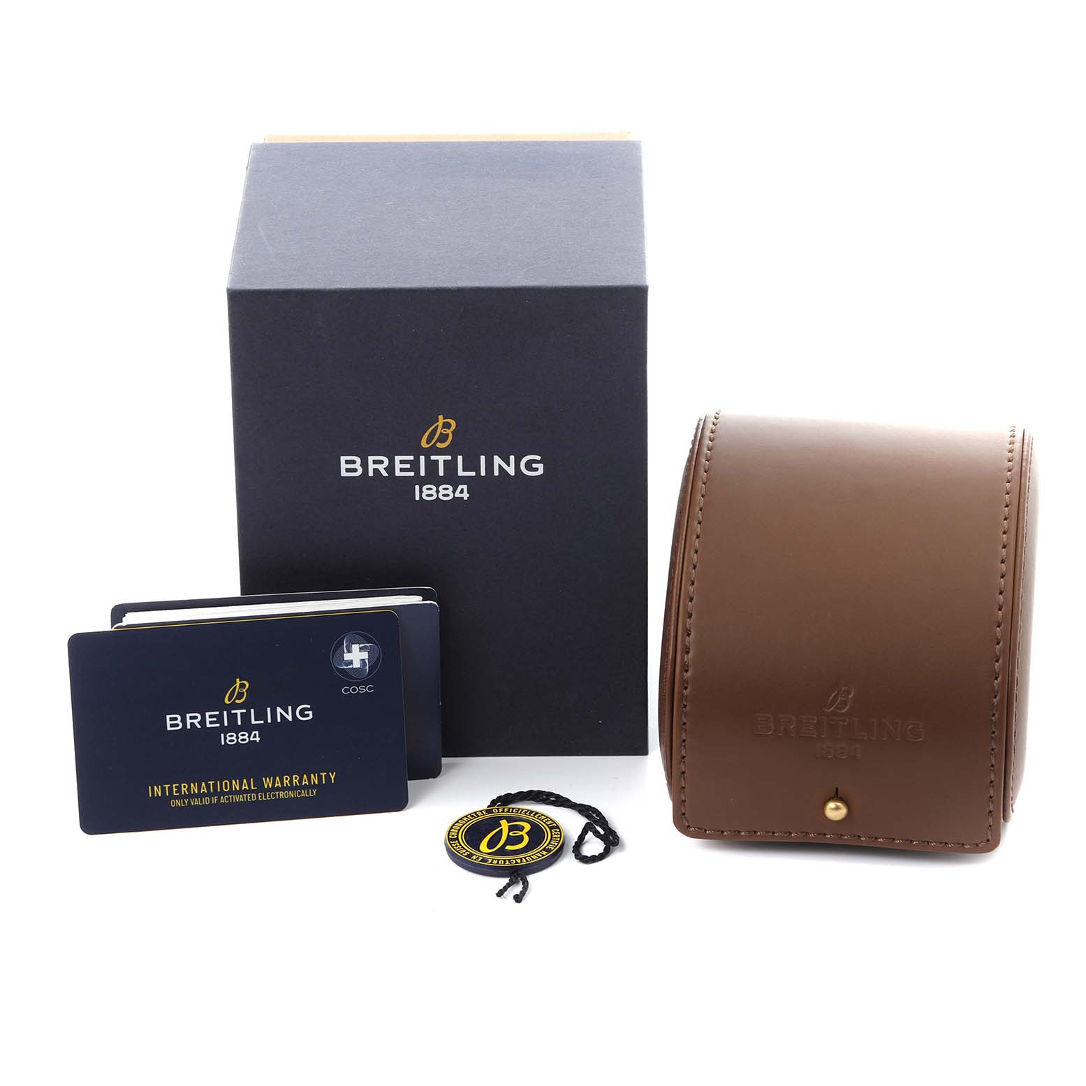 The image shows accessories for the Breitling Superocean U17368 Men's Steel and Gold (two tone) Black Dial U17368 Men's Steel and Gold (two tone) Black Dial: a box, leather case, warranty cards, and a tag.